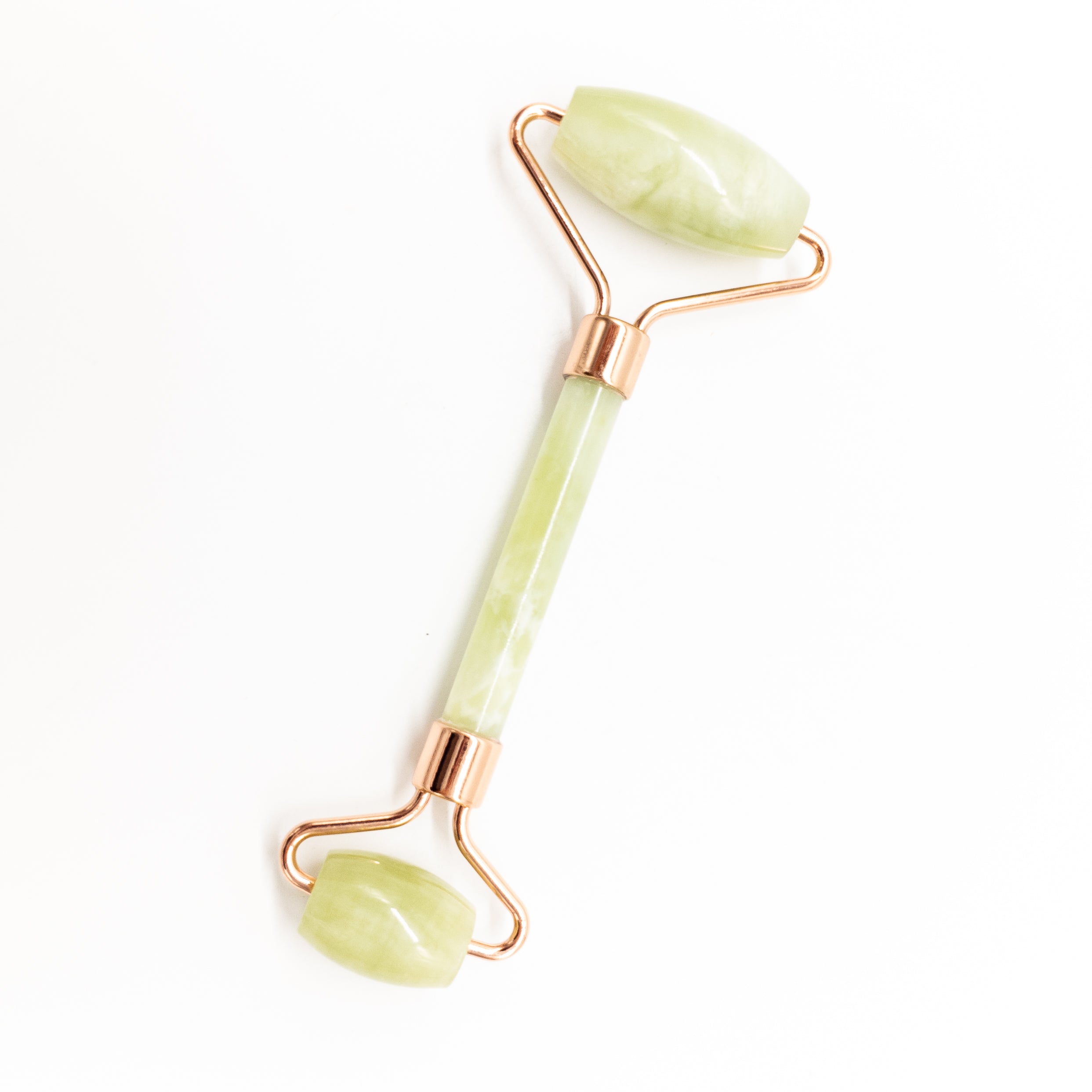 Copper & Crystal Face Roller featuring natural polished crystals, designed for facial massage and skincare.