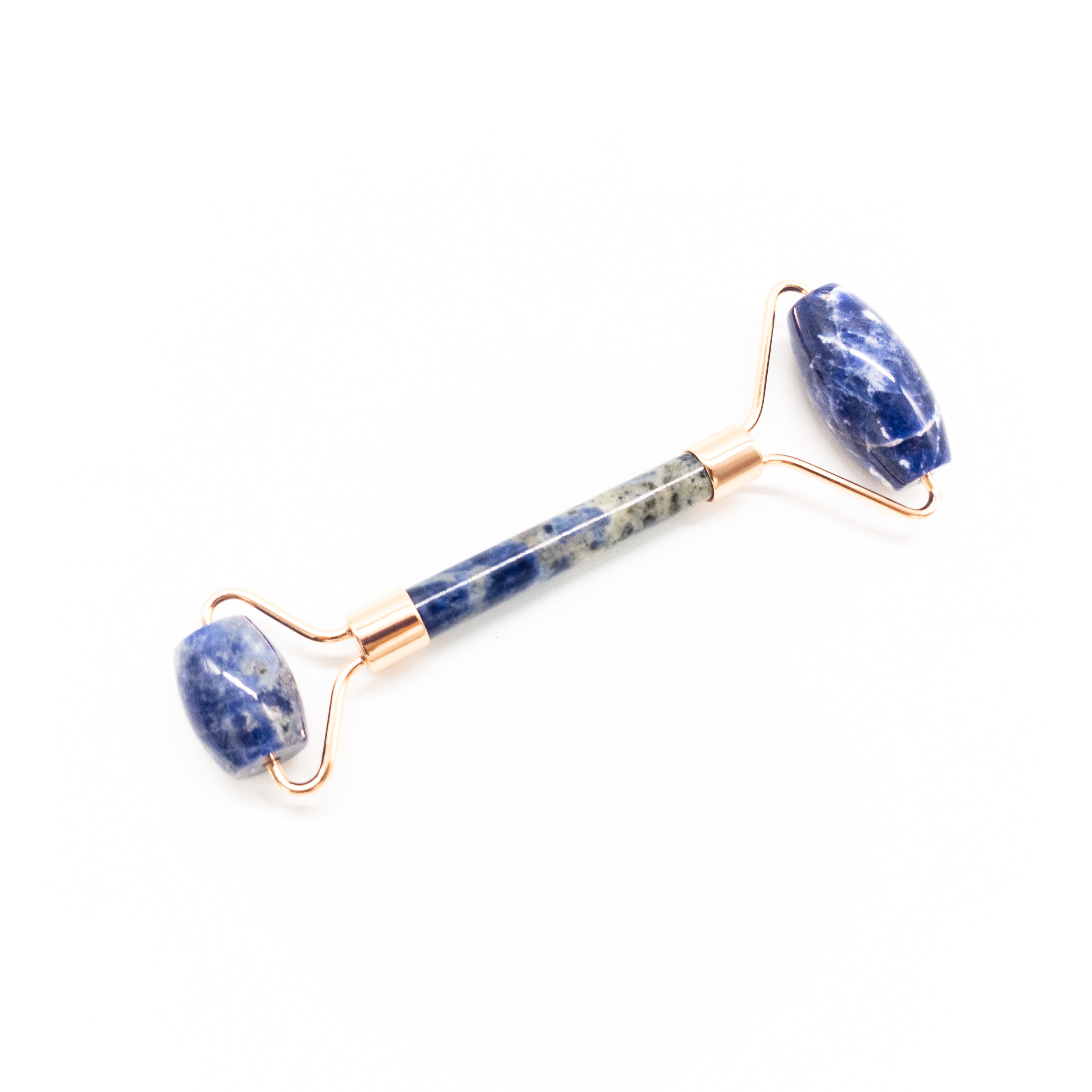 Copper & Crystal Face Roller featuring natural polished crystals, designed for facial massage and skincare.