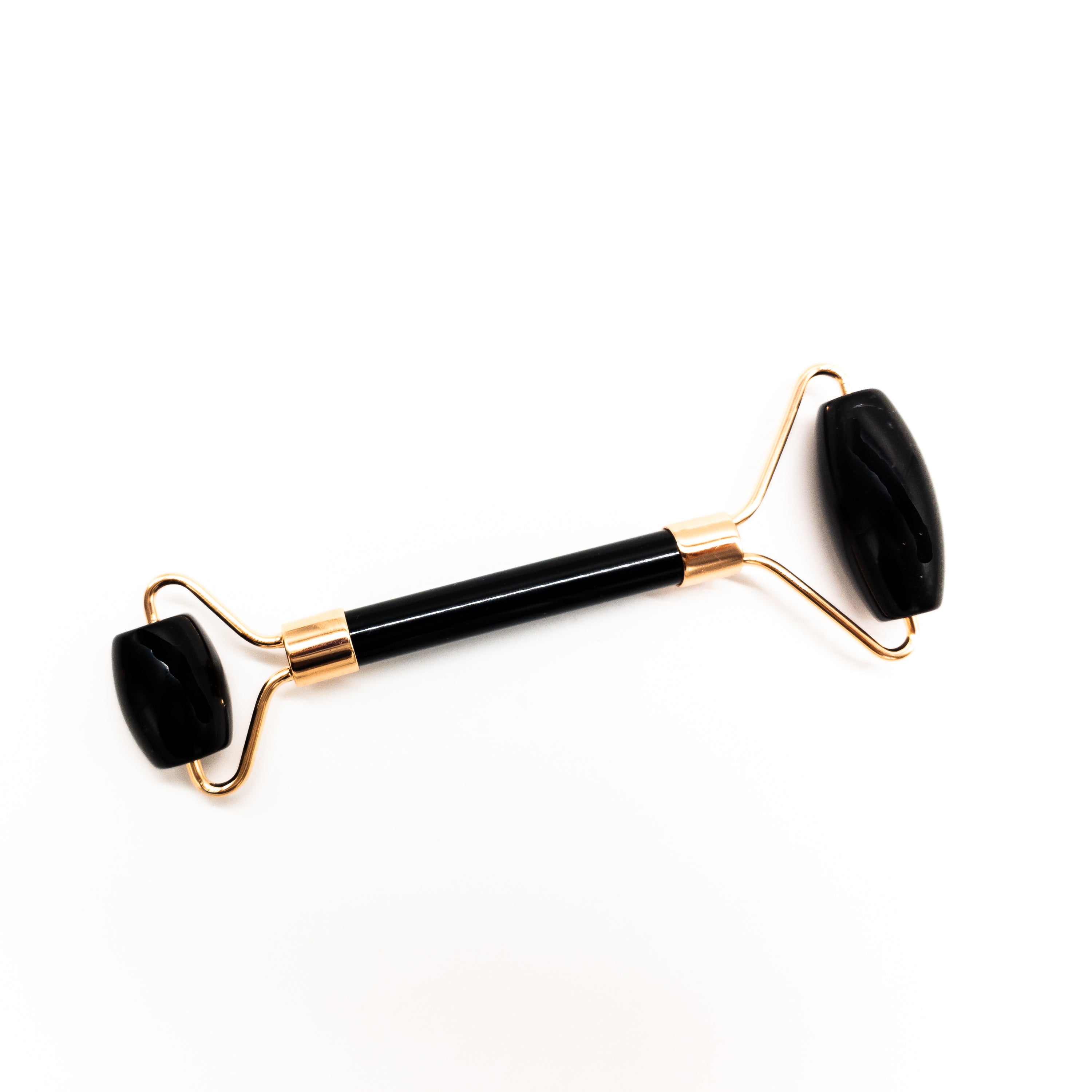 Copper & Crystal Face Roller featuring natural polished crystals, designed for facial massage and skincare.