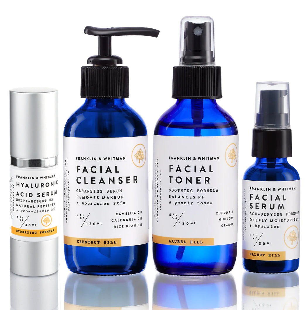 Daily Face Care Kit featuring cleansing serum, toner, and face serum in elegant packaging.