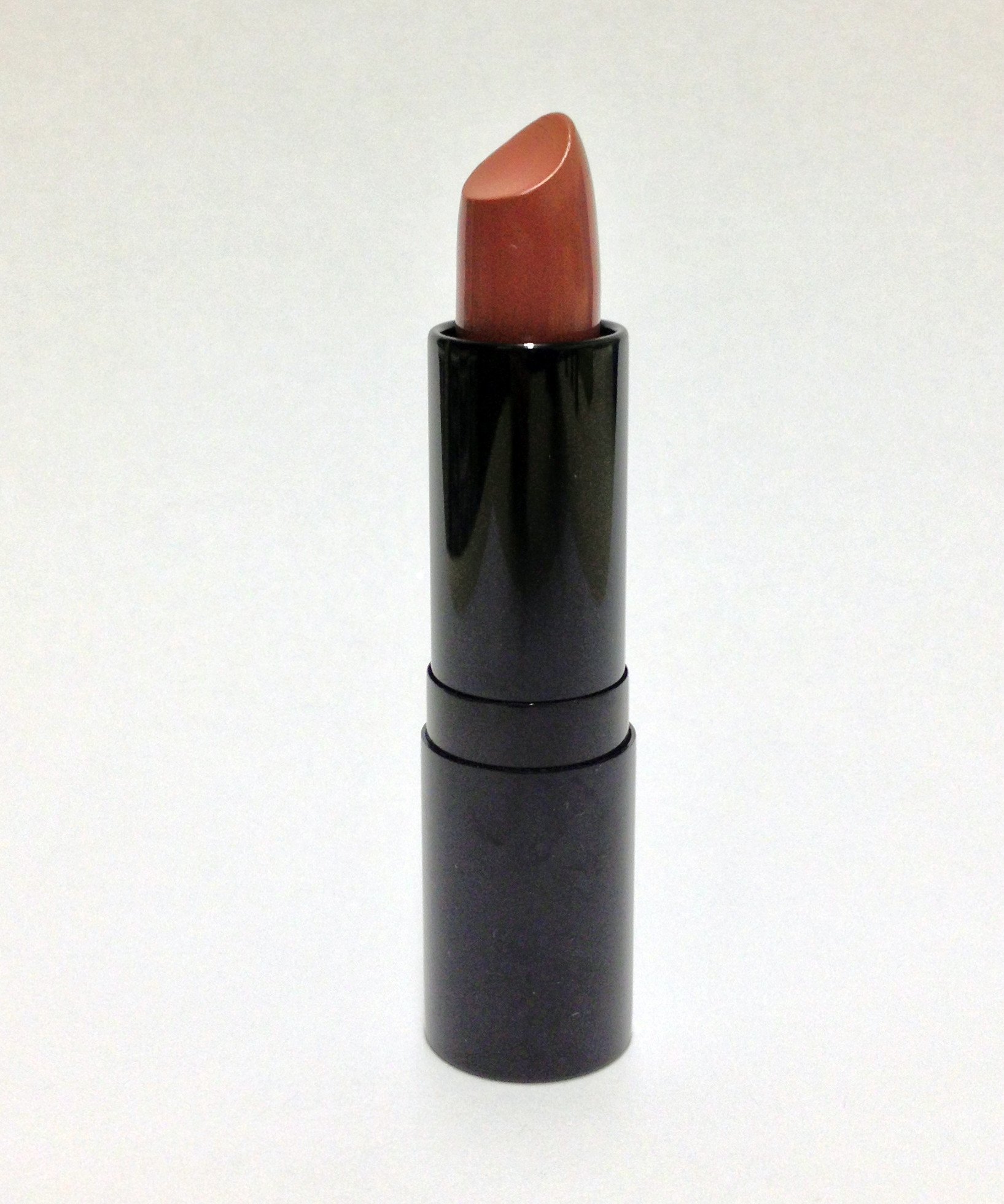 Danyel Lipstick in CoCo, showcasing a rich brown shade in a sleek tube, perfect for vibrant lip color.