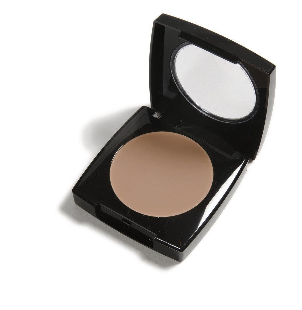 Danyel Mini Concealer Compact in Deep Bronze, showcasing its sleek design and rich color suitable for olive skin tones.