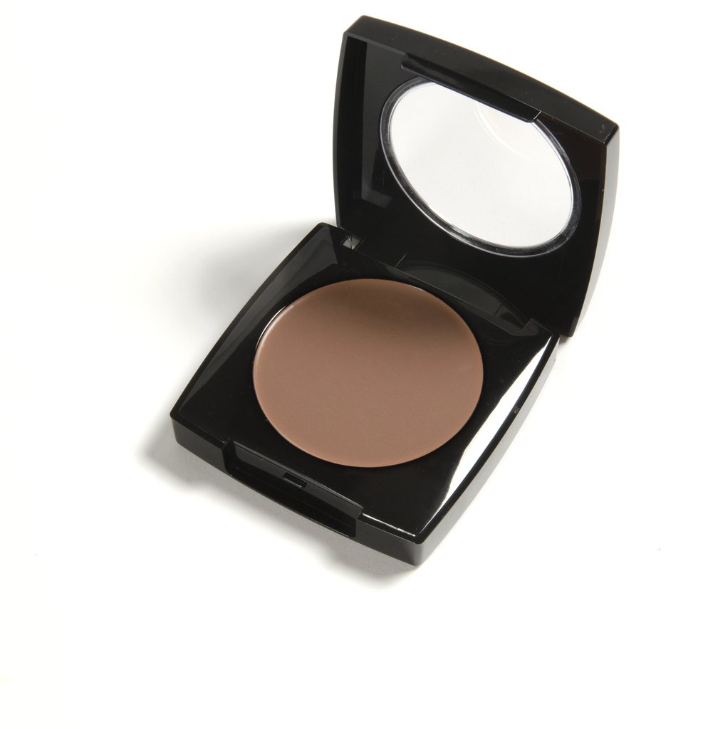 Danyel Mini Concealer Compact in Tawny Beige showcasing its sleek design and rich color for flawless skin coverage.