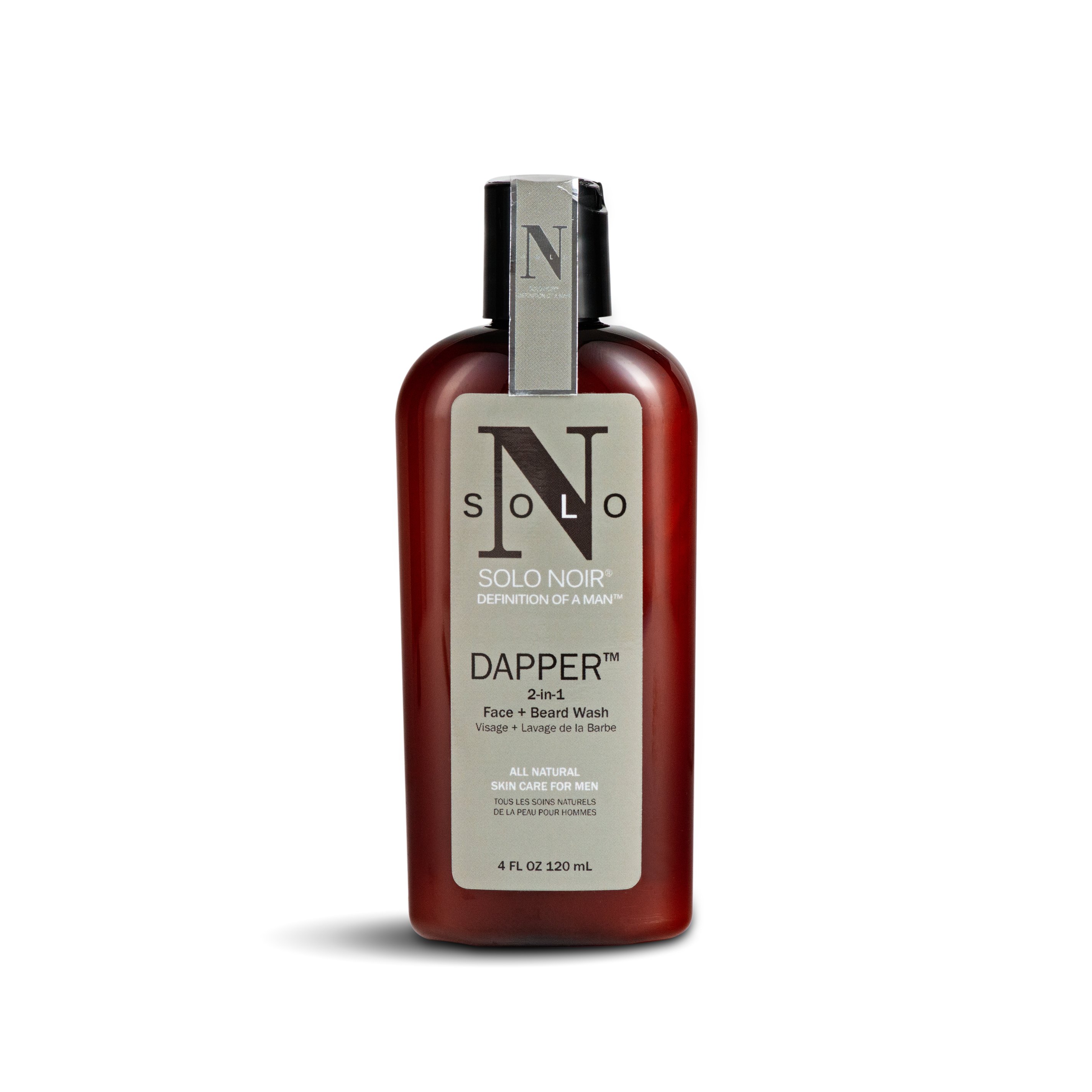 Dapper™ Face + Beard Wash bottle with a sleek design, showcasing its natural ingredients like aloe vera and chamomile.