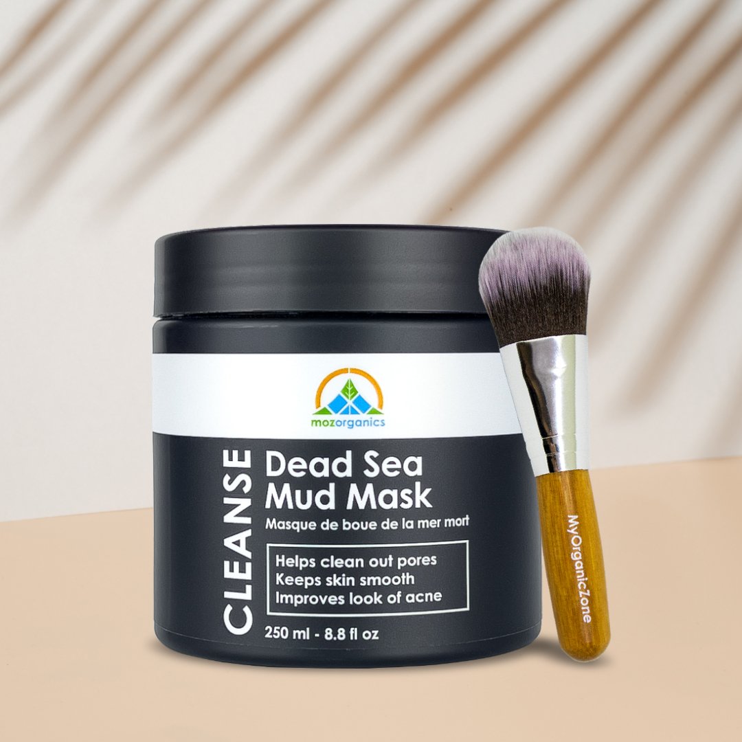 Dead Sea Mud Mask in a jar with a smooth texture, surrounded by natural ingredients like aloe vera and coconut oil.