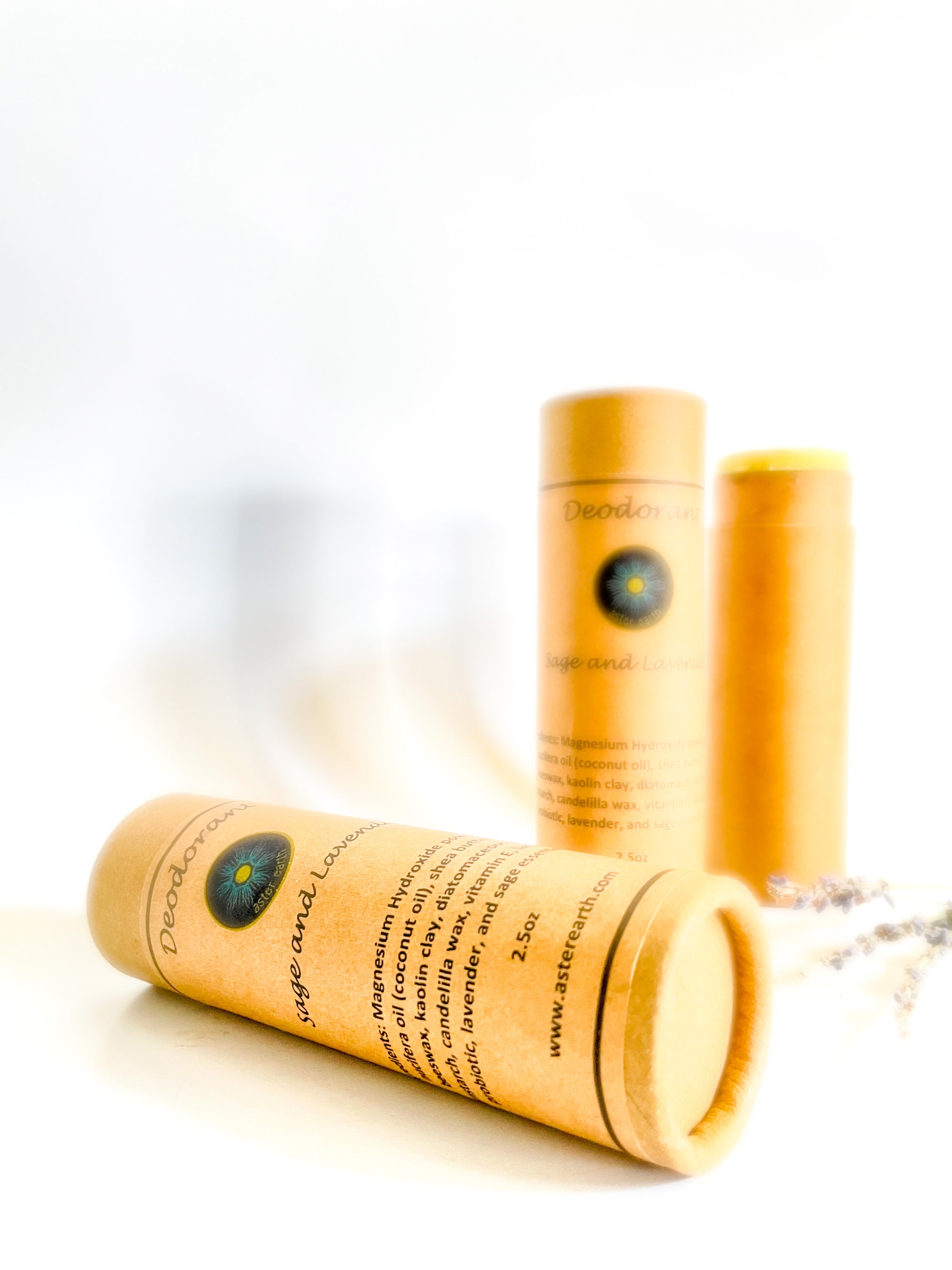 A natural zero waste deodorant stick with eco-friendly packaging, showcasing its organic ingredients like cocoa butter and essential oils.