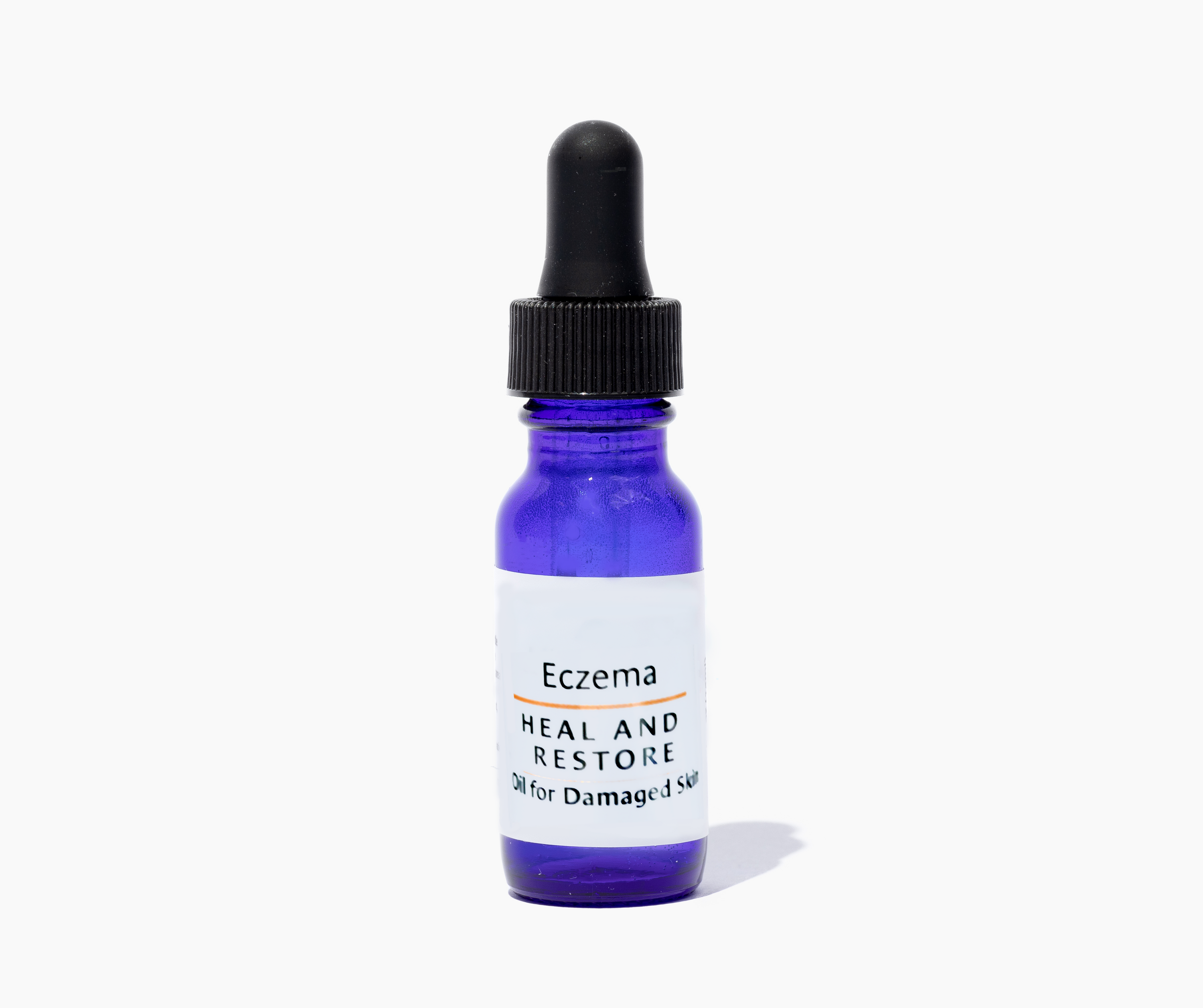 Eczema - Heal and Restore product bottle with natural oils, designed for soothing and healing inflamed skin.