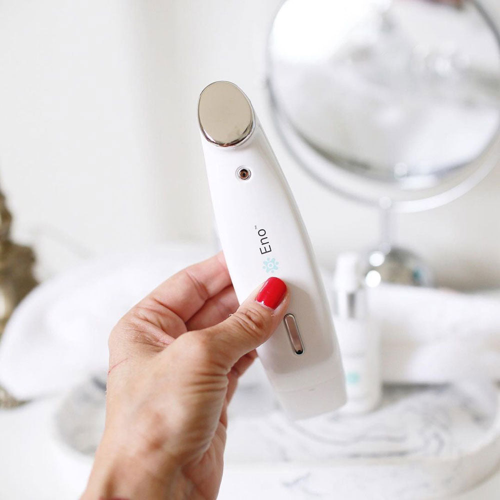 ENO™ All-in-One Facial Device showcasing its sleek design and features for skincare treatment.