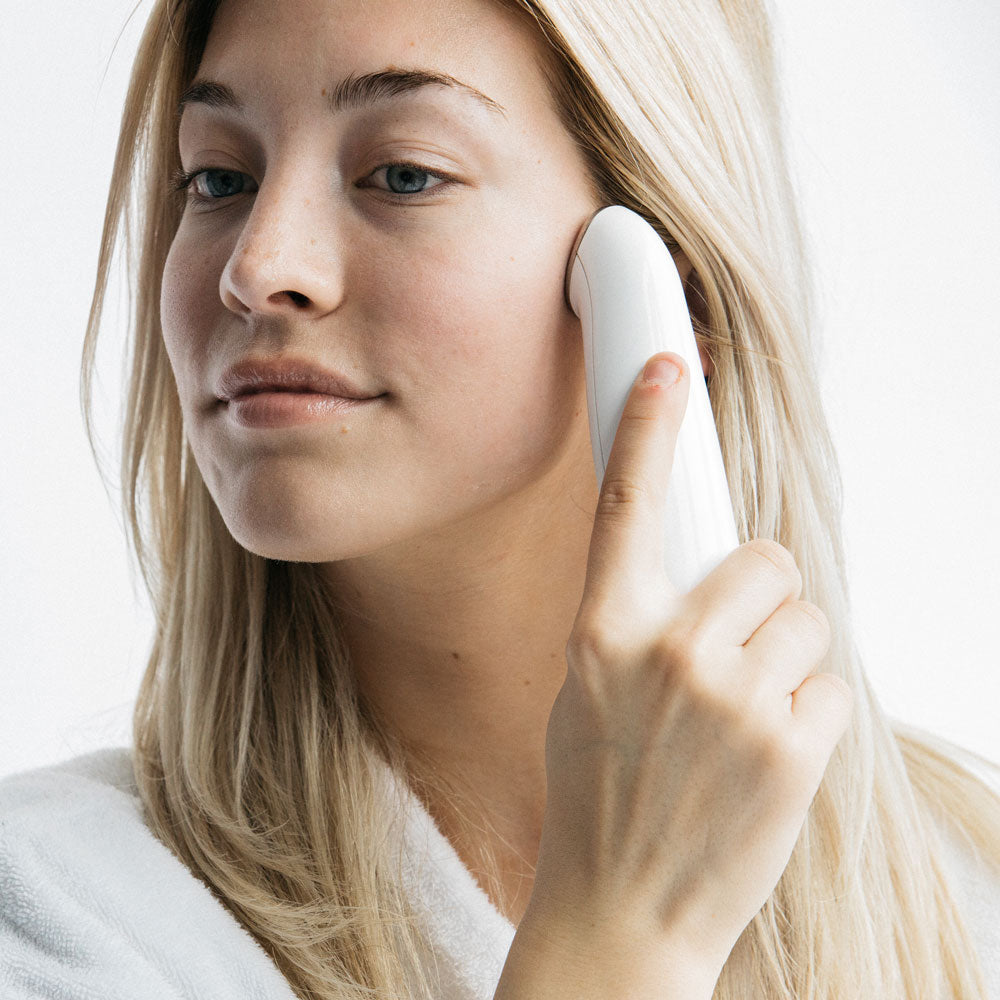 ENO™ All-in-One Facial Device showcasing its sleek design and features for skincare treatment.