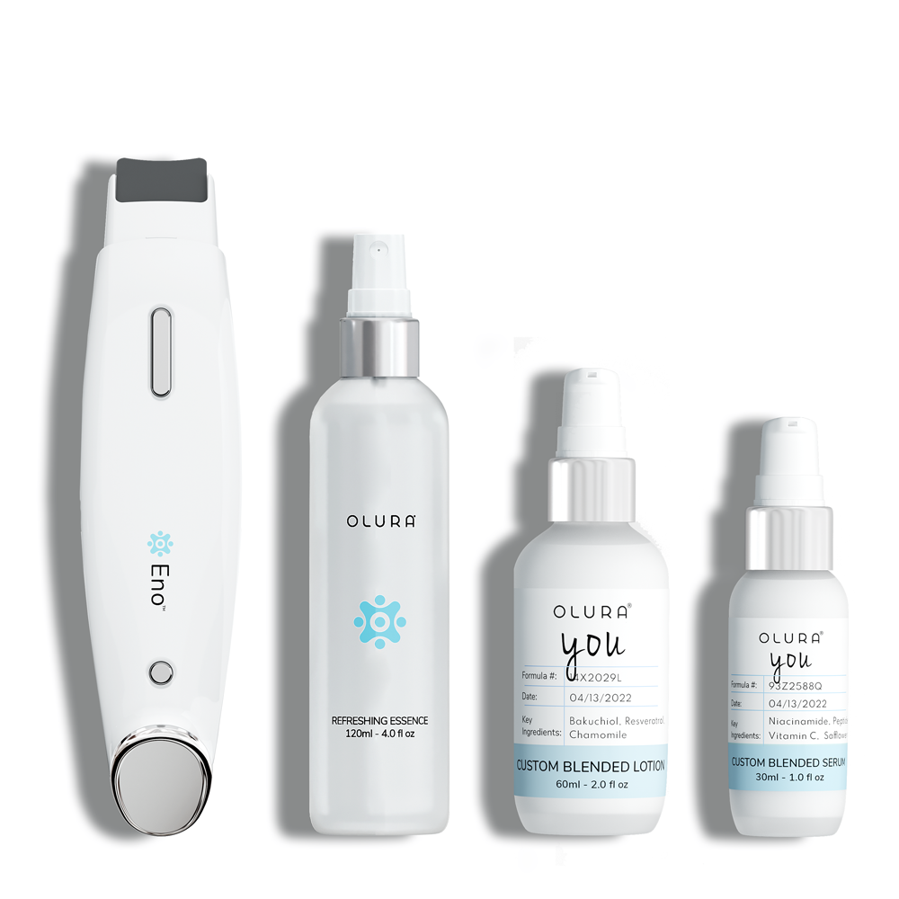 Eno™ Custom Blended Facial Set including device, serum, lotion, and essence for skincare.