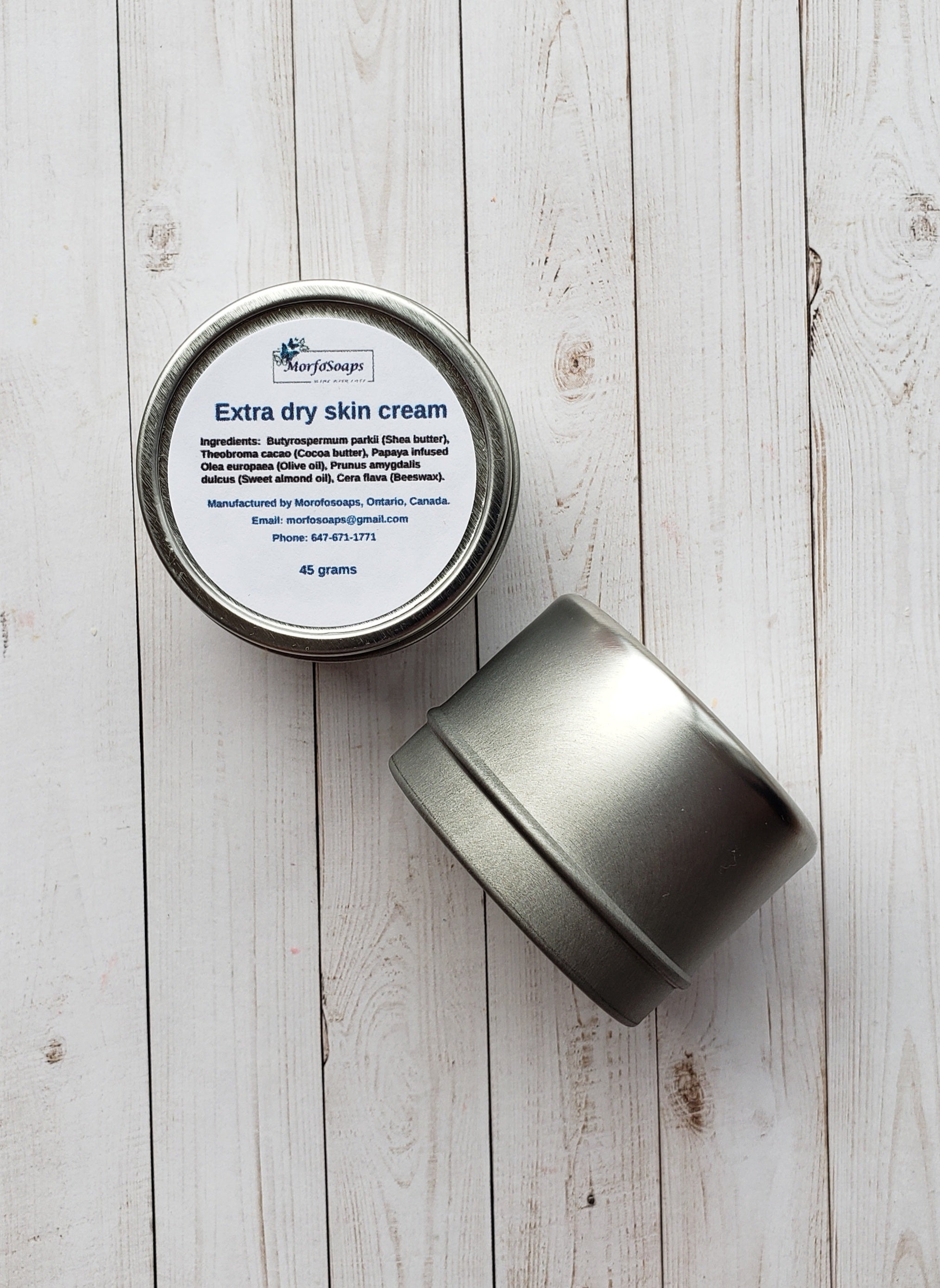 A jar of Morfosoaps Extra Dry Skin Cream with a smooth, creamy texture, showcasing its natural ingredients and luxurious appeal.