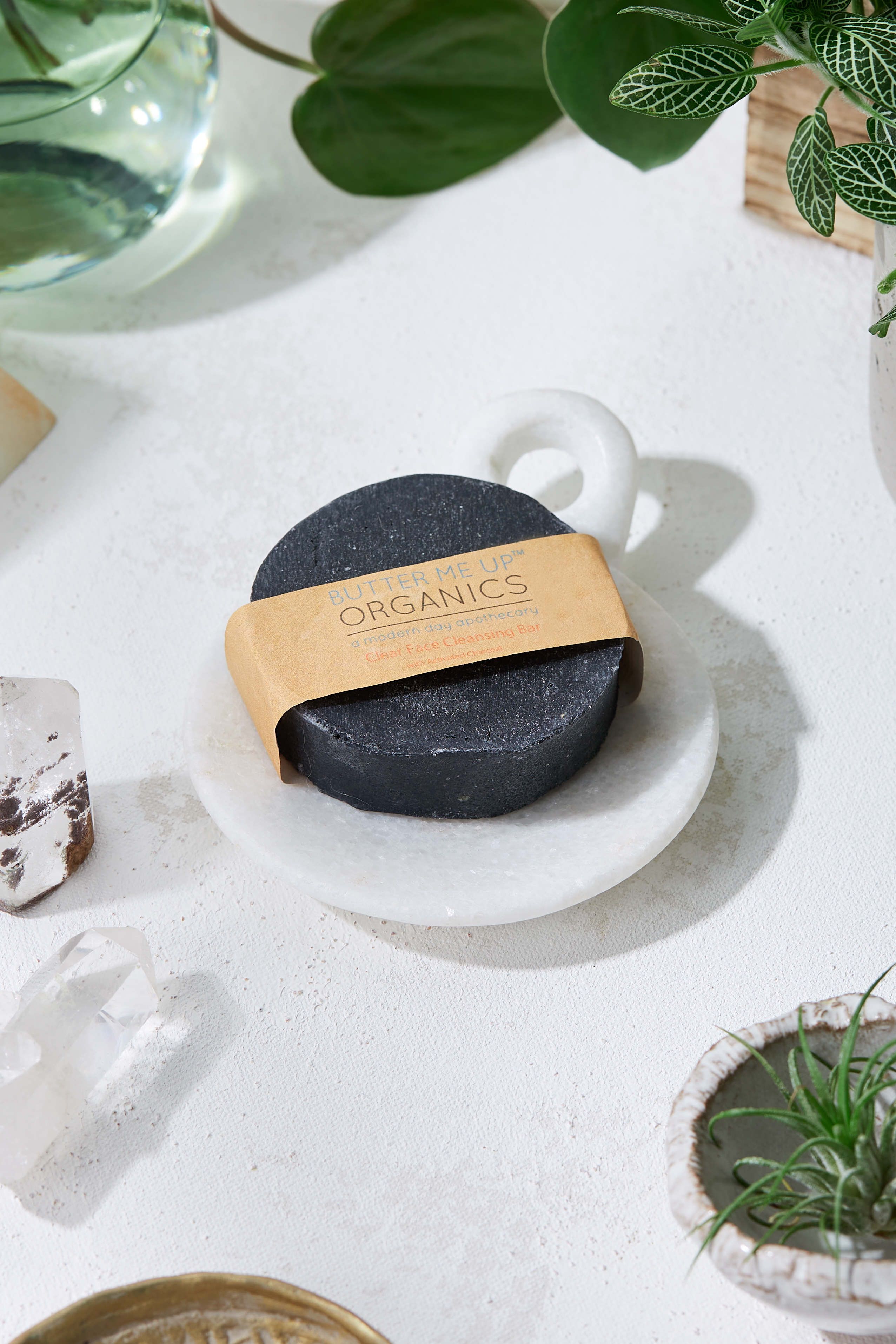 Organic Activated Charcoal Face Soap bar with natural ingredients, showcasing its rich texture and eco-friendly packaging.