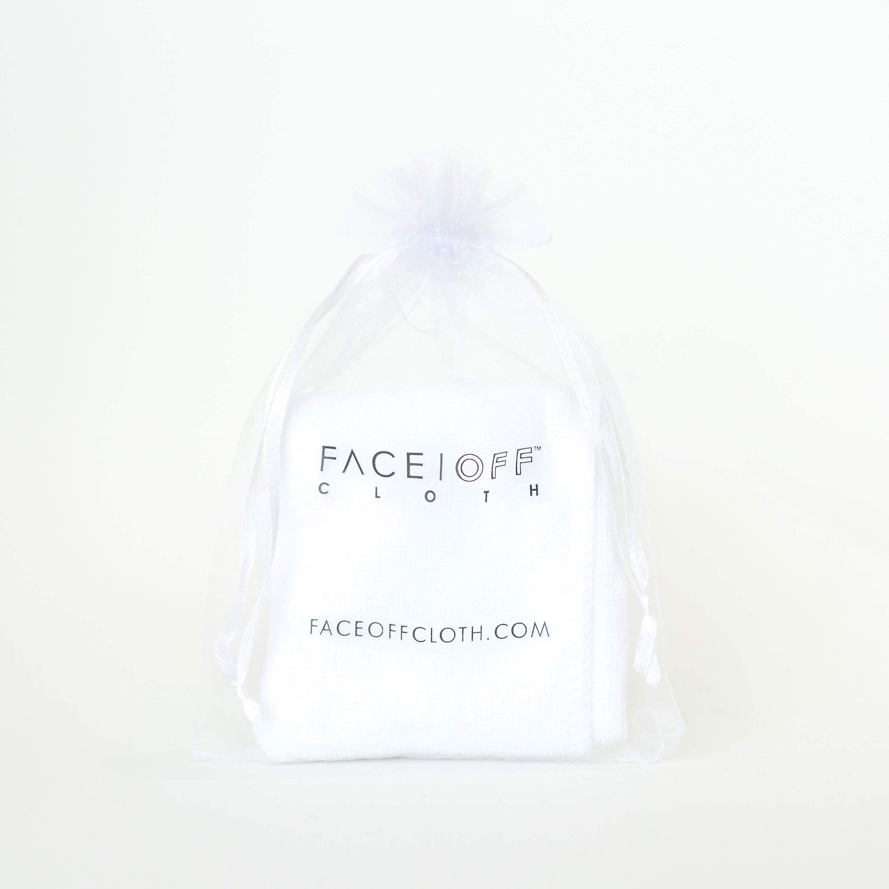 FaceOff Trial Cloth displayed on a clean surface, showcasing its soft texture and reusable design for makeup removal.