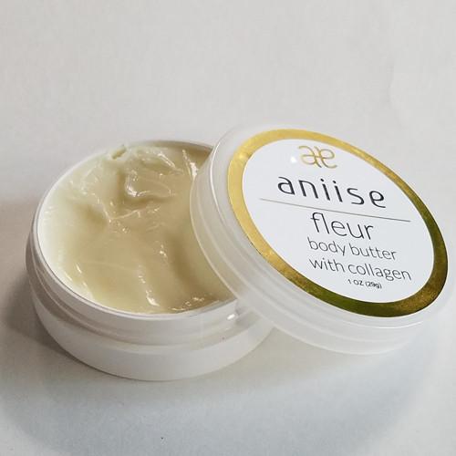 Fleur Body Butter with Collagen in a stylish jar, showcasing its creamy texture and natural ingredients.