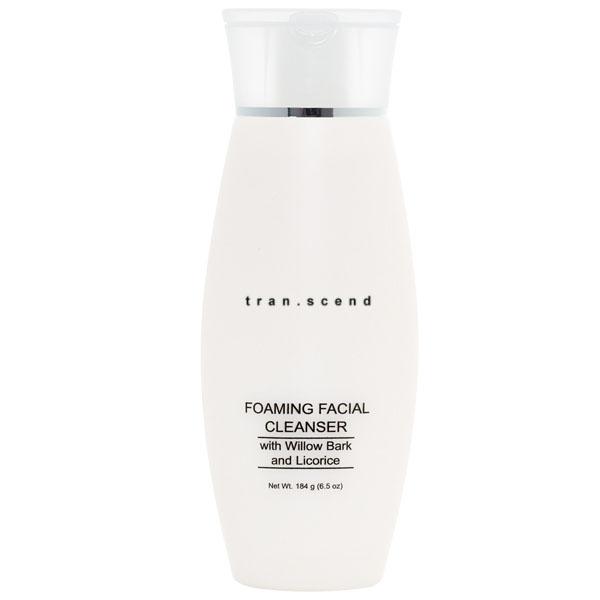 A bottle of Foaming Facial Cleanser with a foamy texture, showcasing its gentle cleansing properties and key ingredients.