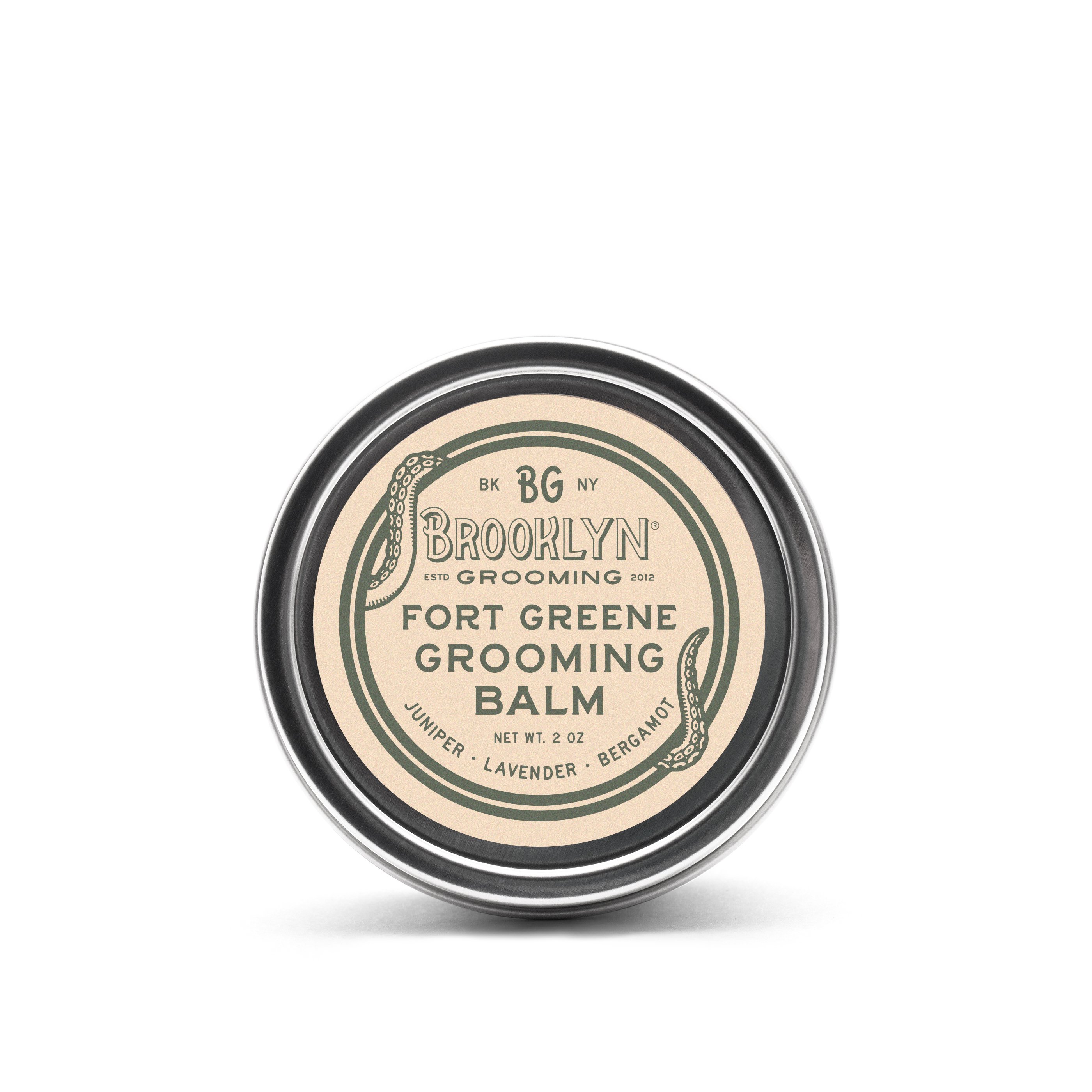 Fort Greene Grooming Balm in a sleek aluminum tin, showcasing its natural ingredients and herbal scent.