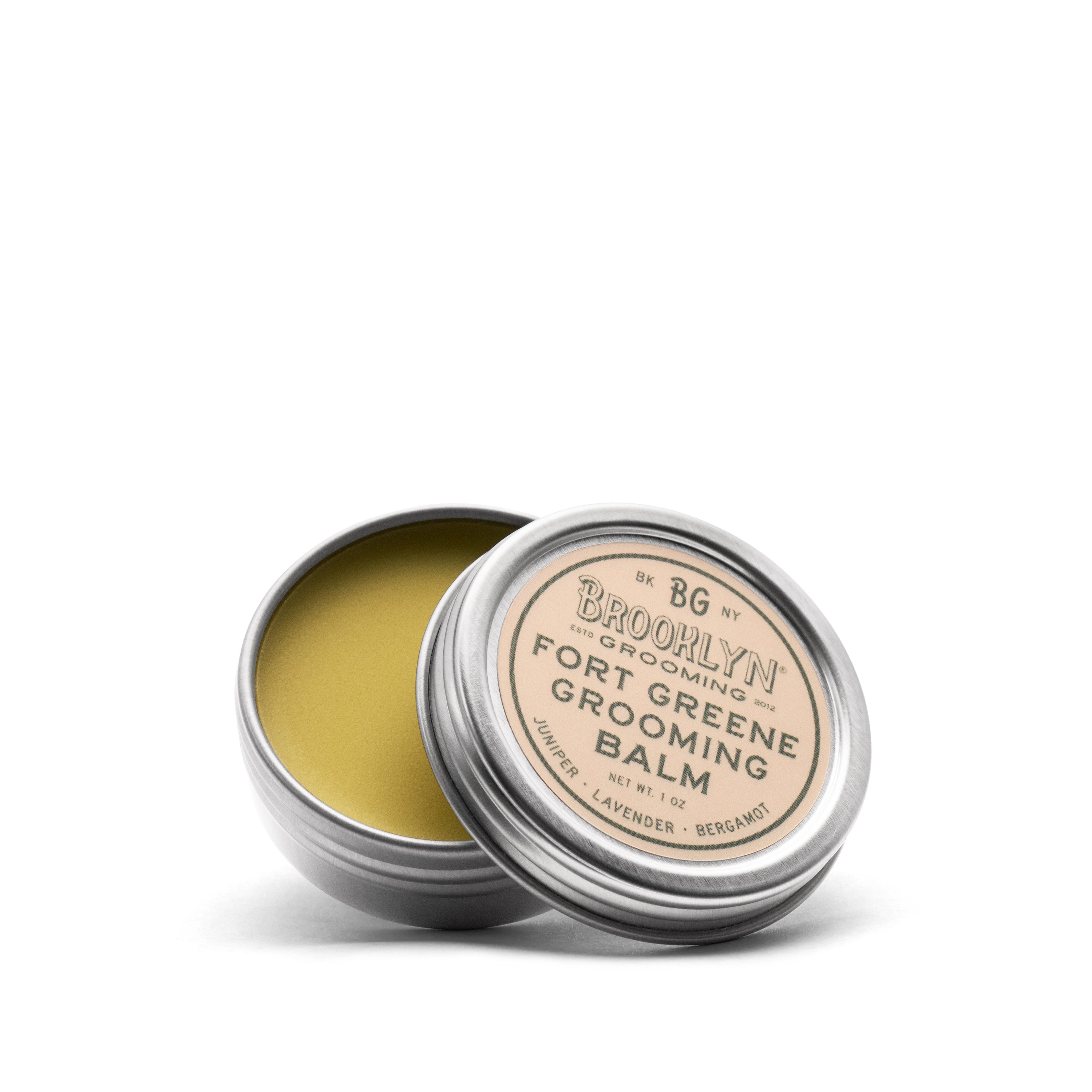 Fort Greene Grooming Balm in a sleek aluminum tin, showcasing its natural ingredients and herbal scent.