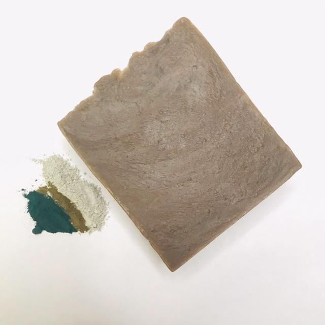 French Green Tea Soap bar with natural ingredients like green tea, cocoa butter, and olive oil, showcasing its creamy texture and vibrant color.