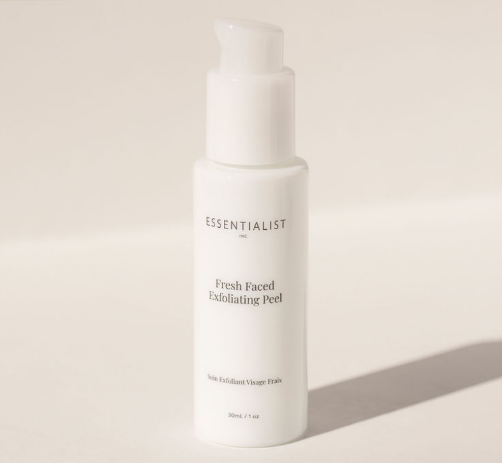 Fresh Faced Exfoliating Peel bottle with a sleek design, showcasing its key ingredients like Lactic Acid and Vitamin C.