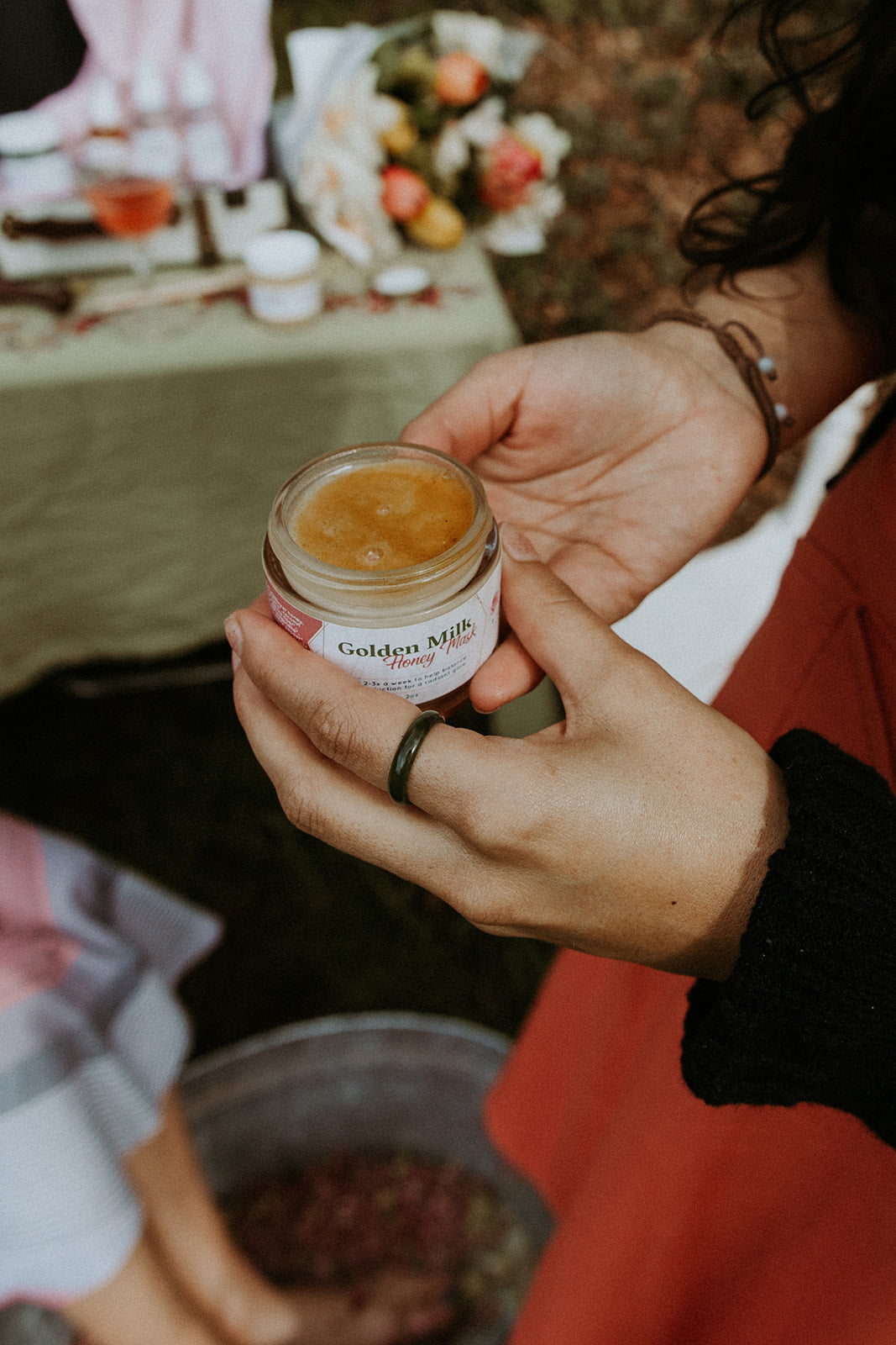 Golden Milk Honey Mask in a 2oz glass jar, showcasing its rich, golden texture and natural ingredients.