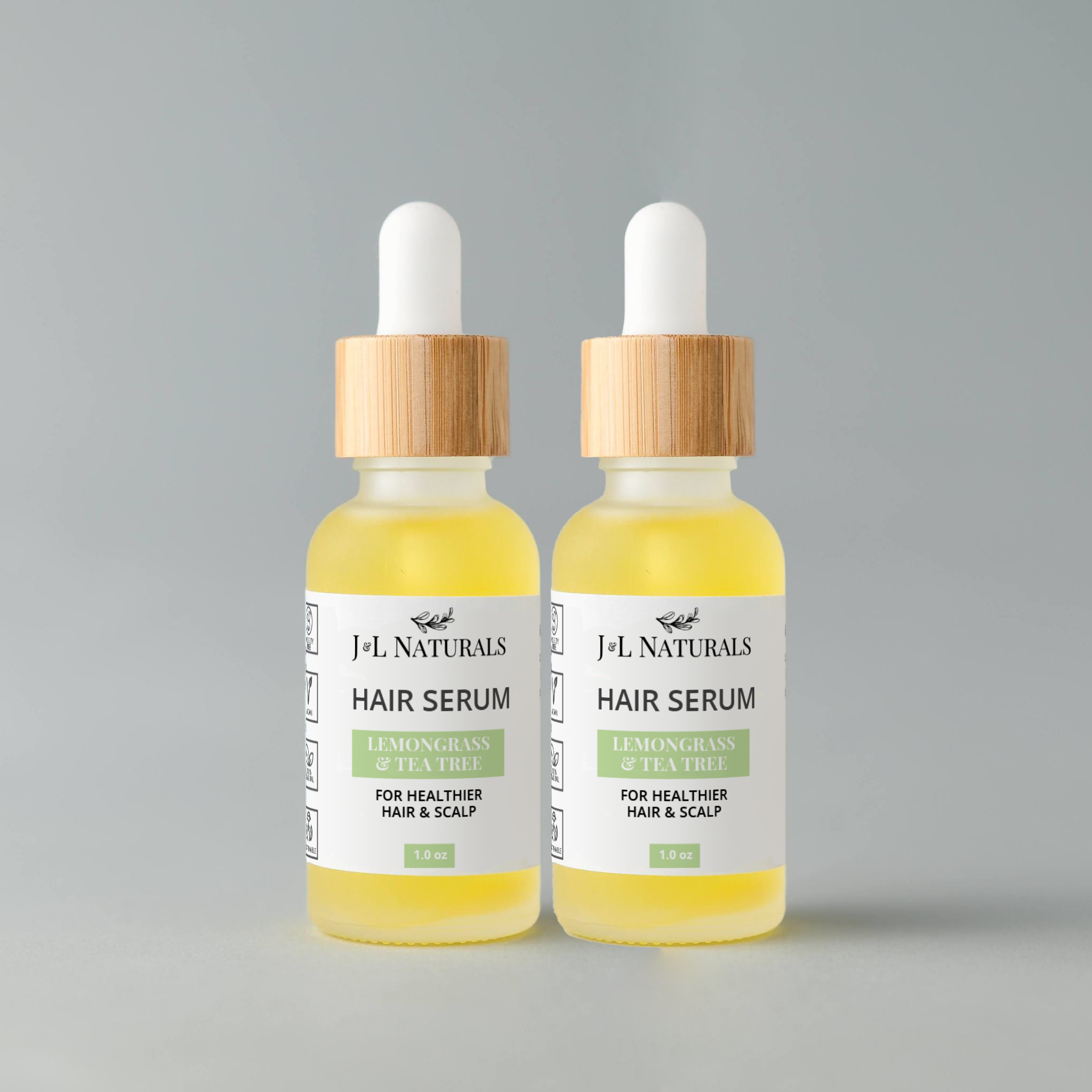 Hair Serum Duo featuring two 1.0 fl oz bottles with various scents for hair nourishment and care.