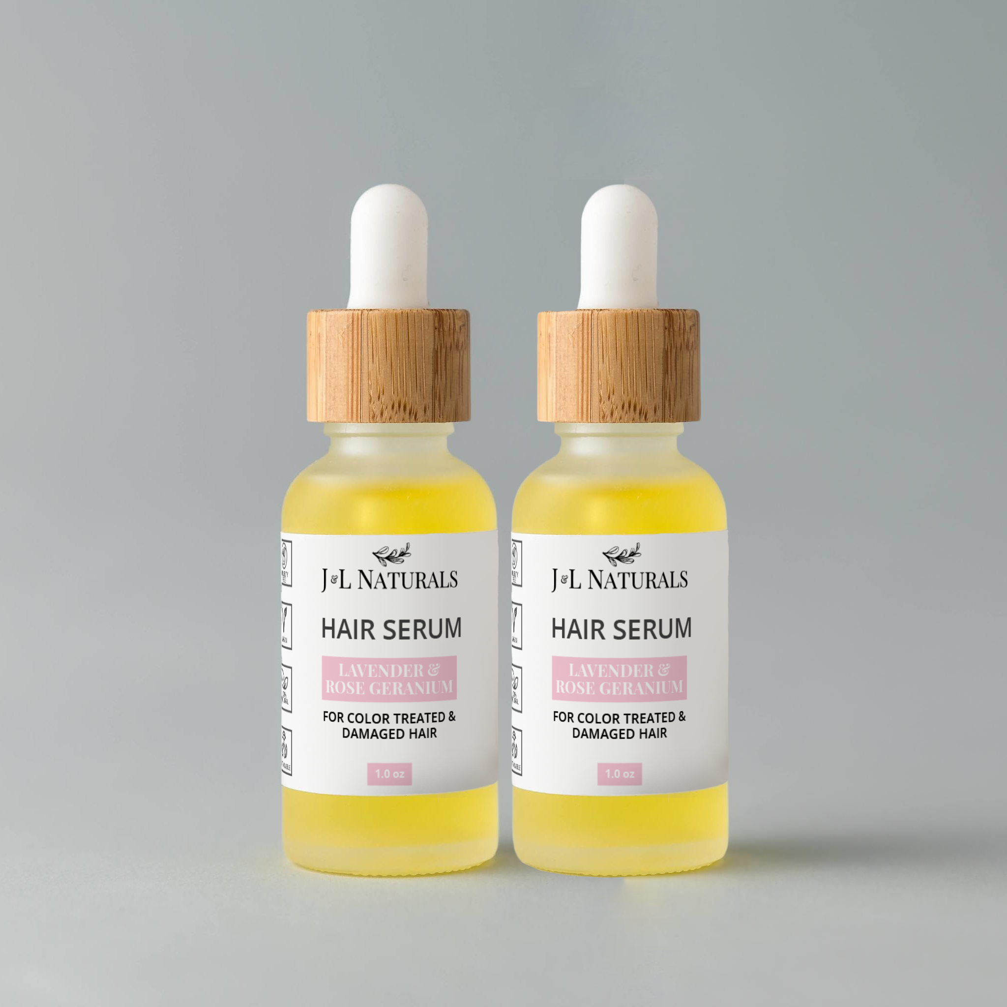 Hair Serum Duo featuring two 1.0 fl oz bottles with various scents for hair nourishment and care.