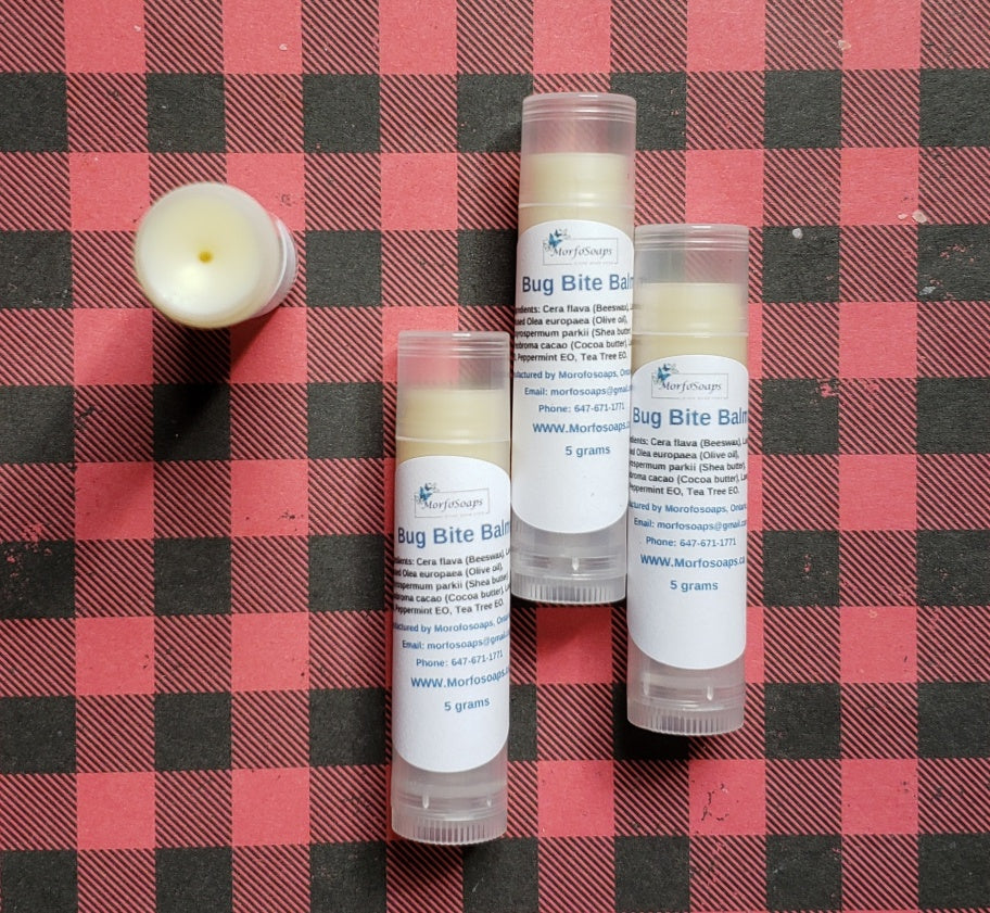 A small jar of Morfosoaps' Handmade Bug Bite Balm with a natural ingredients label, showcasing its soothing properties.