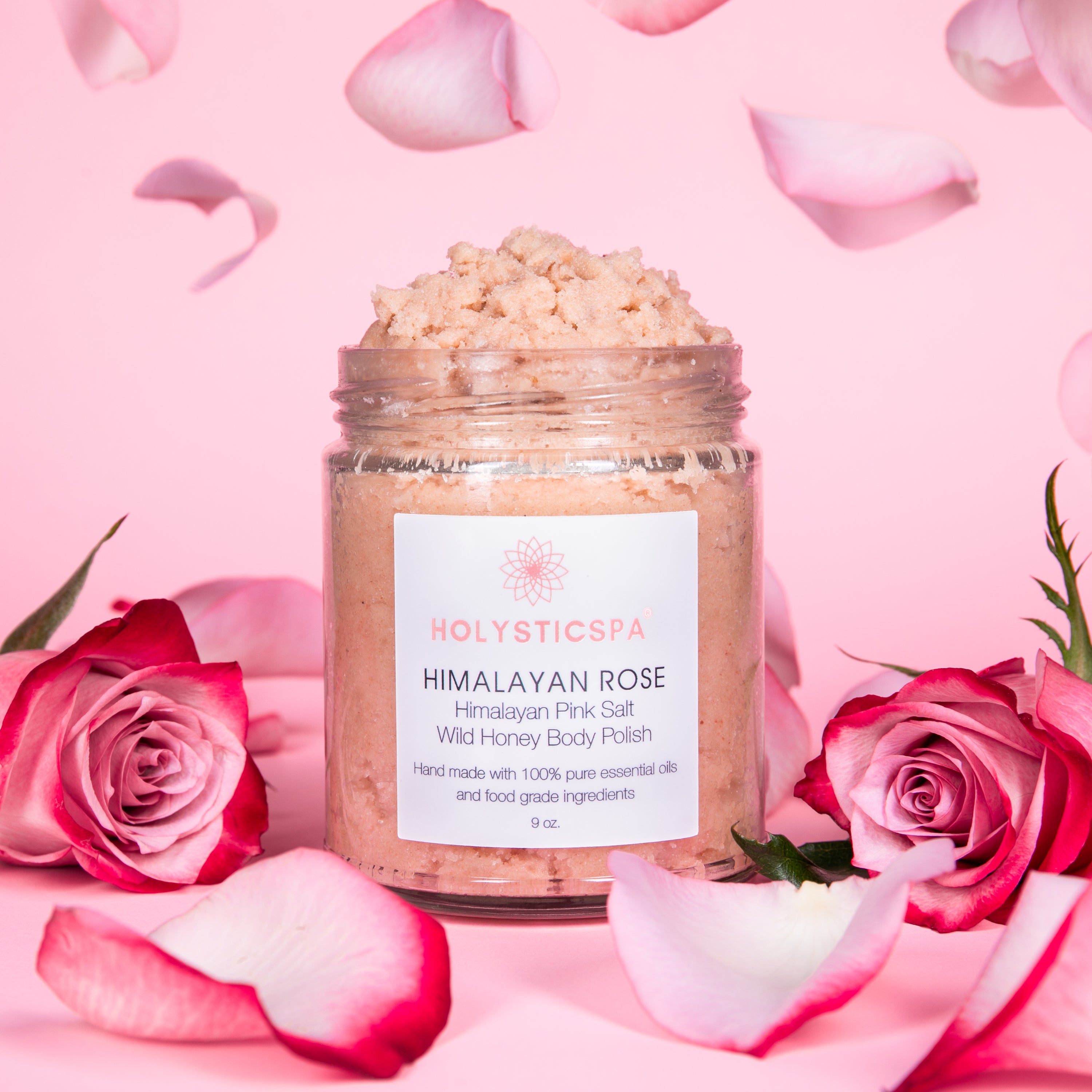 Himalayan Rose Body Polish jar with pink salt and rose petals, showcasing its natural ingredients and luxurious texture.