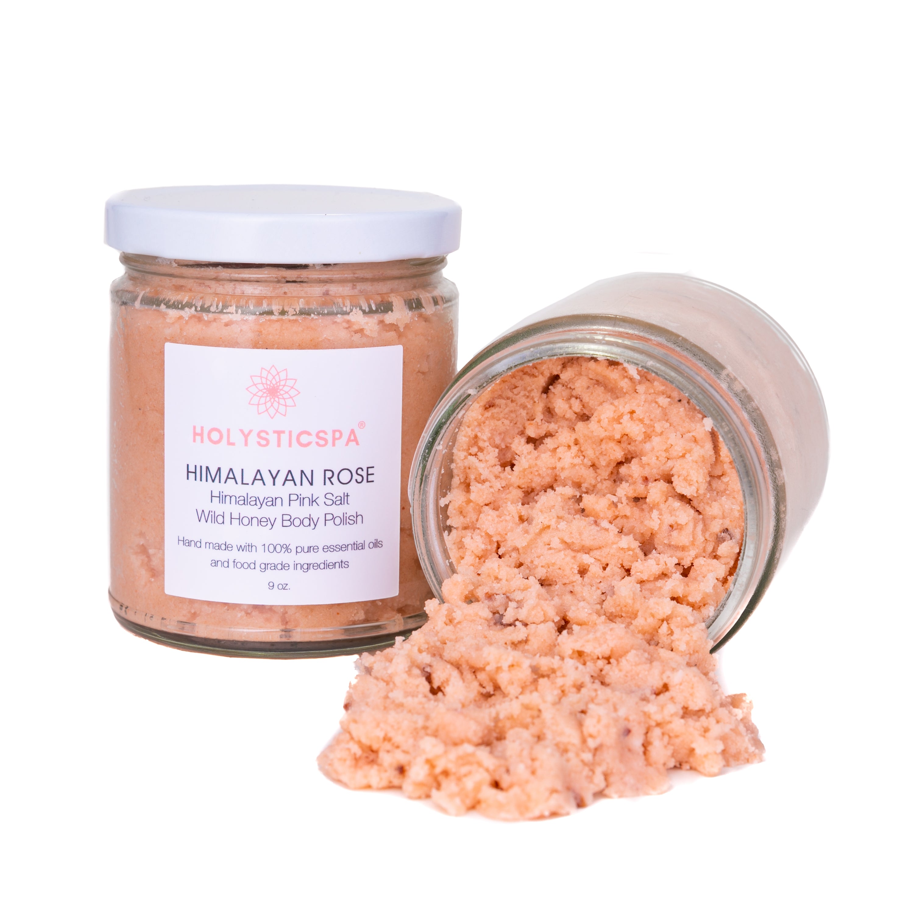 Himalayan Rose Body Polish jar with pink salt and rose petals, showcasing its natural ingredients and luxurious texture.