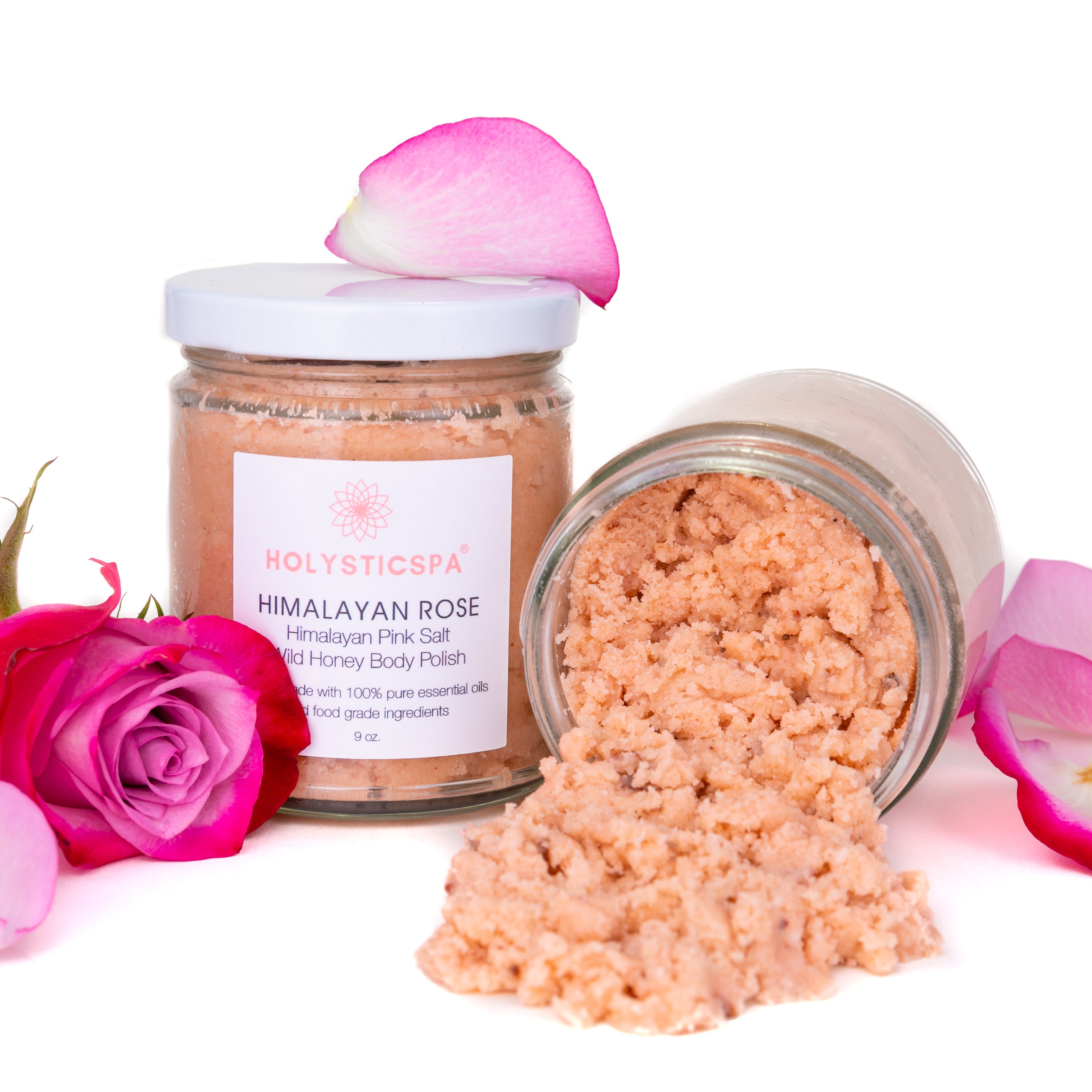 Himalayan Rose Body Polish jar with pink salt and rose petals, showcasing its natural ingredients and luxurious texture.