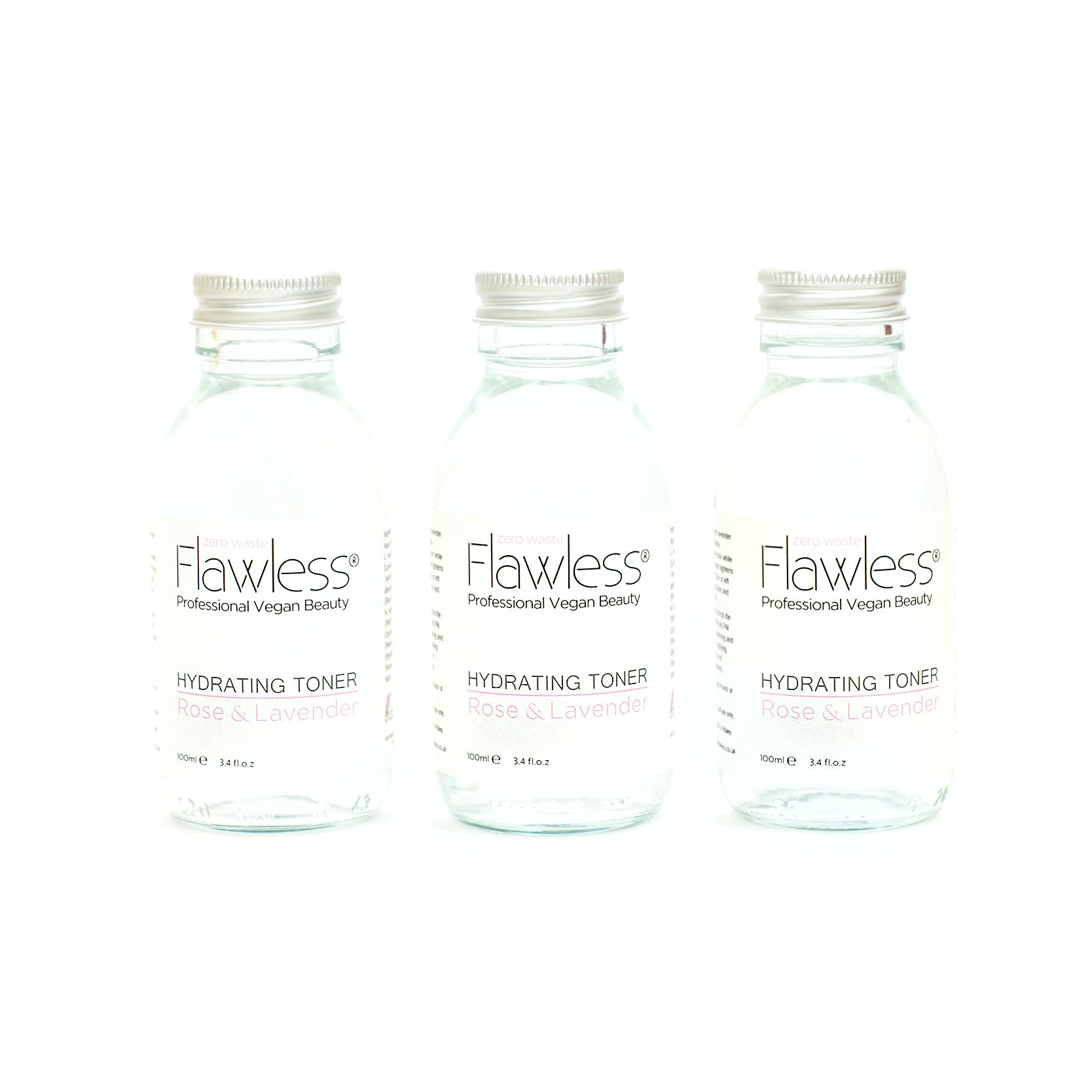 Hydrating Toner in a recycled glass bottle with rose and lavender ingredients, showcasing its eco-friendly packaging.