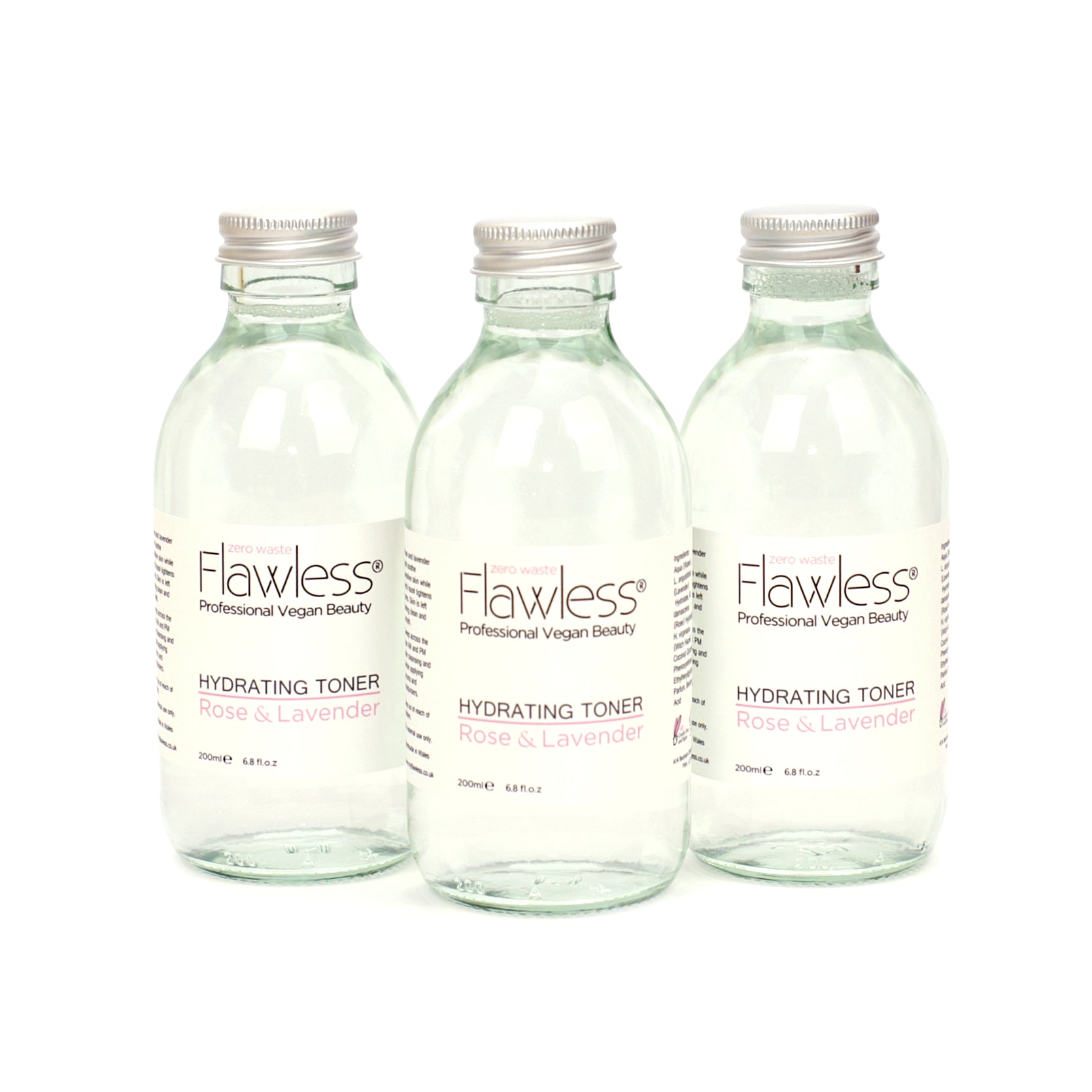 Hydrating Toner in a recycled glass bottle with rose and lavender ingredients, showcasing its eco-friendly packaging.