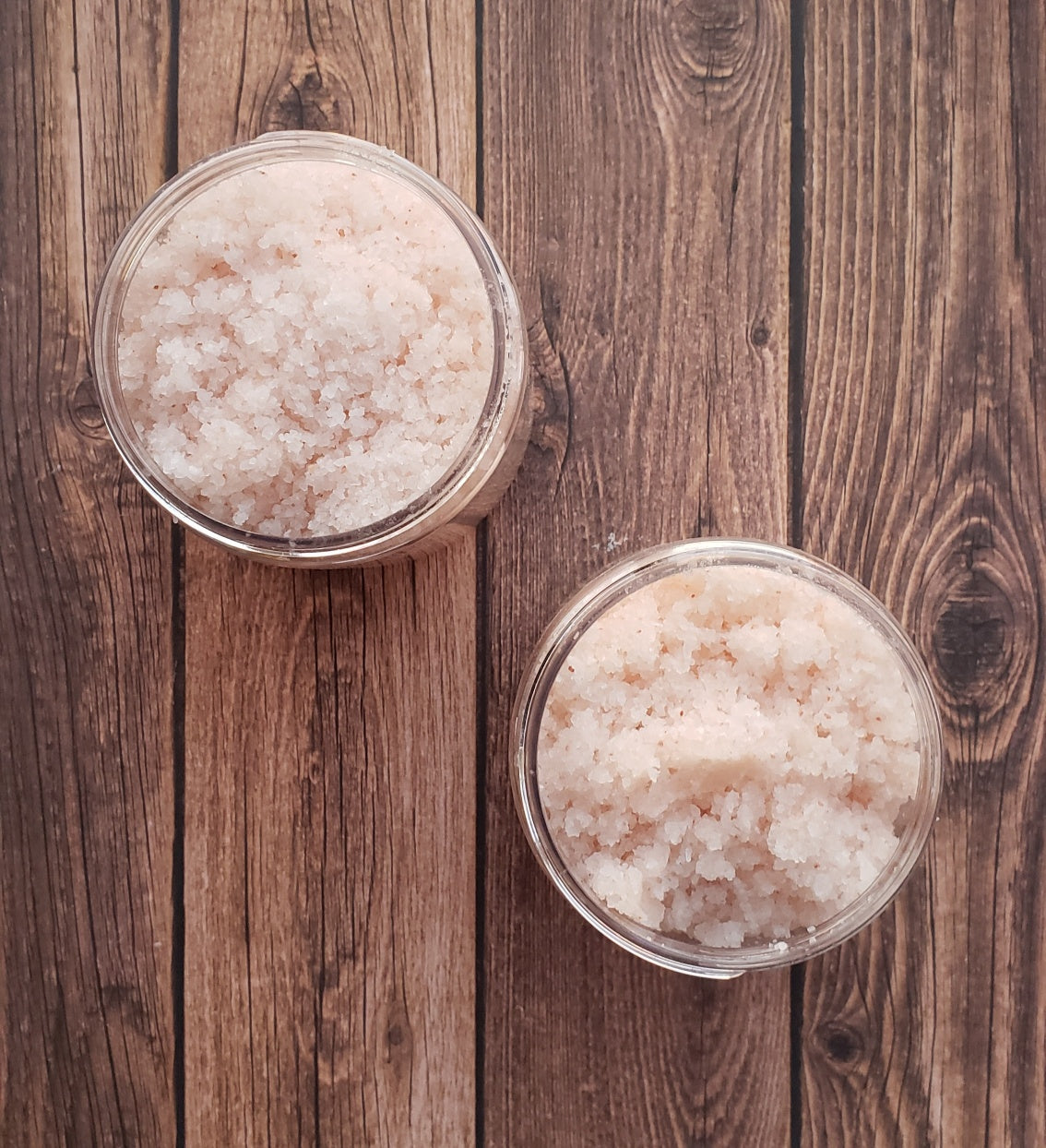 A jar of Lavender Bath Salts with dried lavender buds, showcasing its natural ingredients and soothing properties.