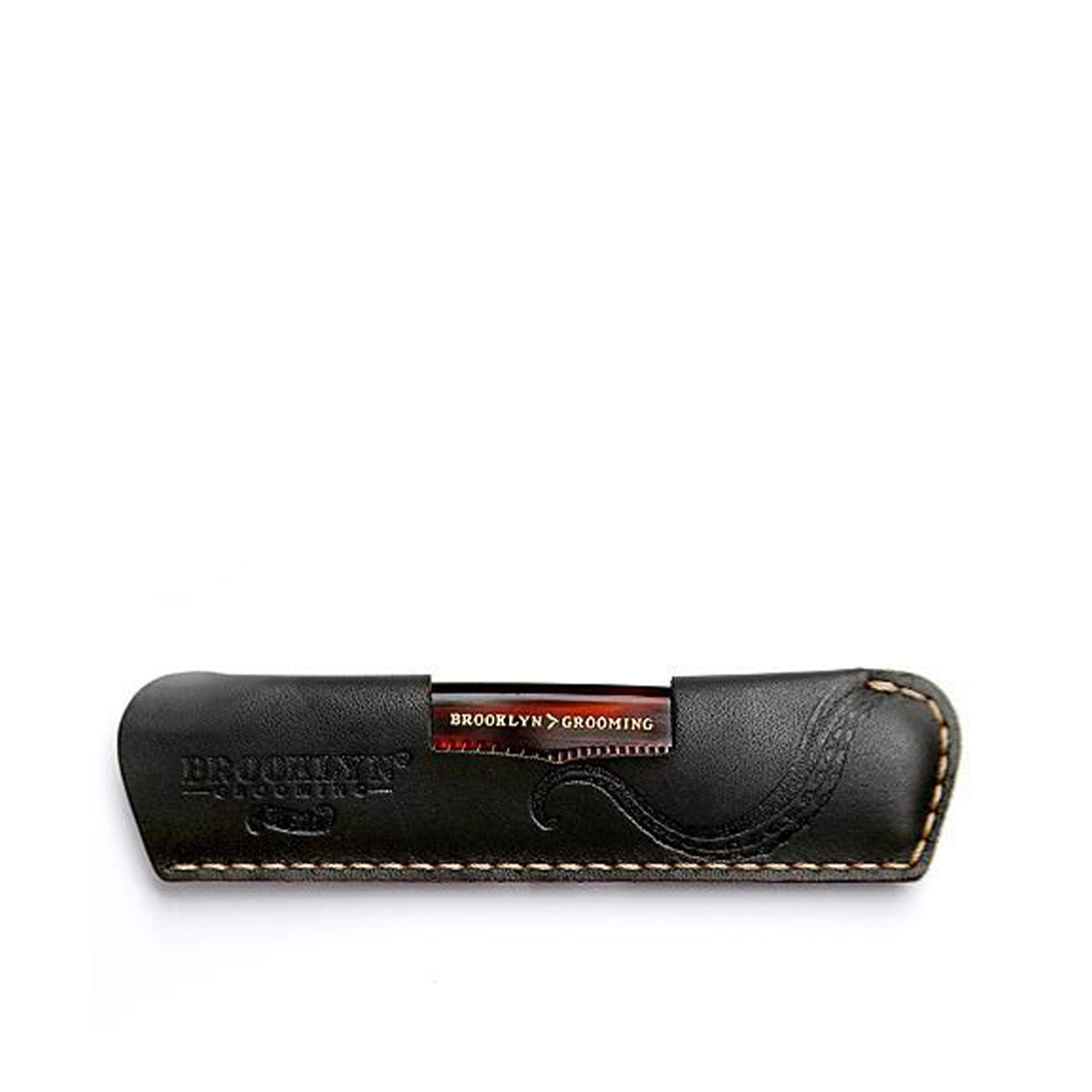 A luxurious leather comb sleeve with a pocket comb, featuring black leather and gold stitching, handcrafted in the USA.