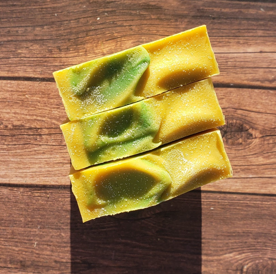 Handmade Lemon Eucalyptus Soap bar with natural ingredients, showcasing its unique design and texture.