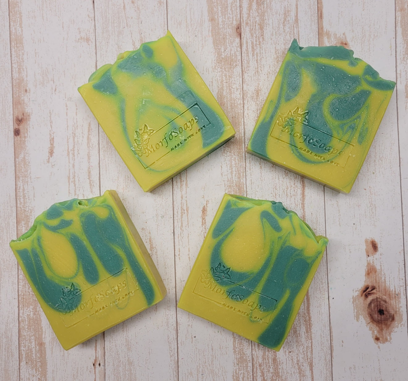 Handmade Lemon Eucalyptus Soap bar with natural ingredients, showcasing its unique design and texture.