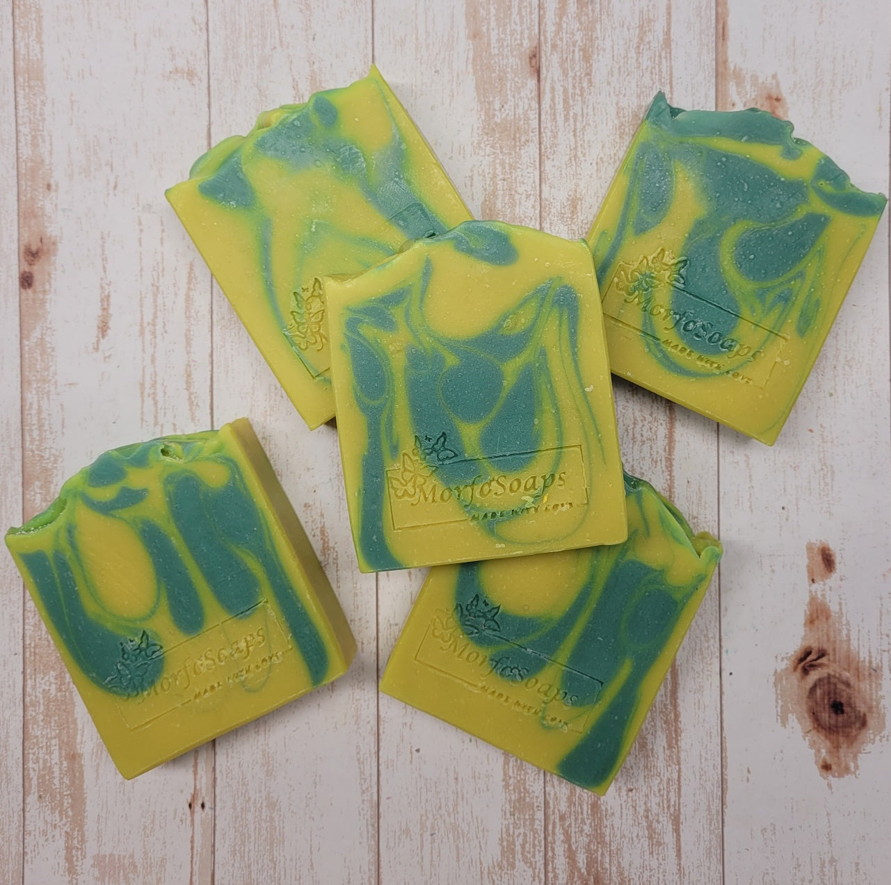 Handmade Lemon Eucalyptus Soap bar with natural ingredients, showcasing its unique design and texture.