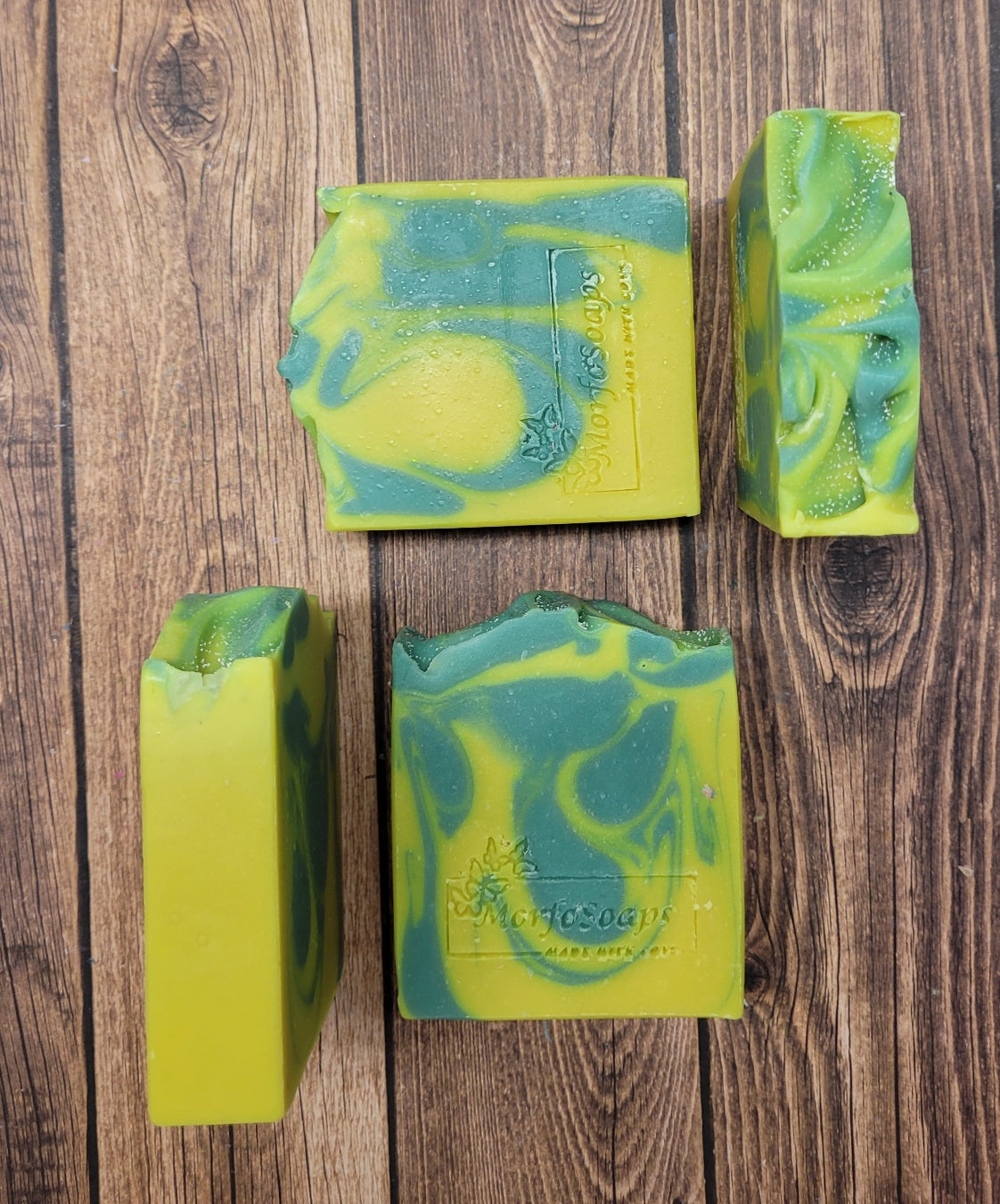 Handmade Lemon Eucalyptus Soap bar with natural ingredients, showcasing its unique design and texture.