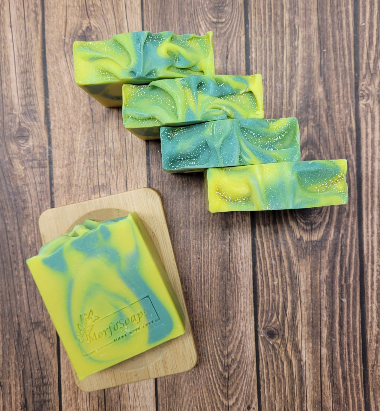 Handmade Lemon Eucalyptus Soap bar with natural ingredients, showcasing its unique design and texture.