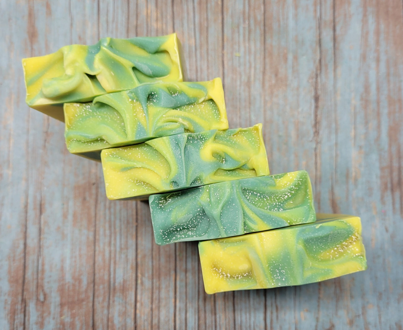 Handmade Lemon Eucalyptus Soap bar with natural ingredients, showcasing its unique design and texture.