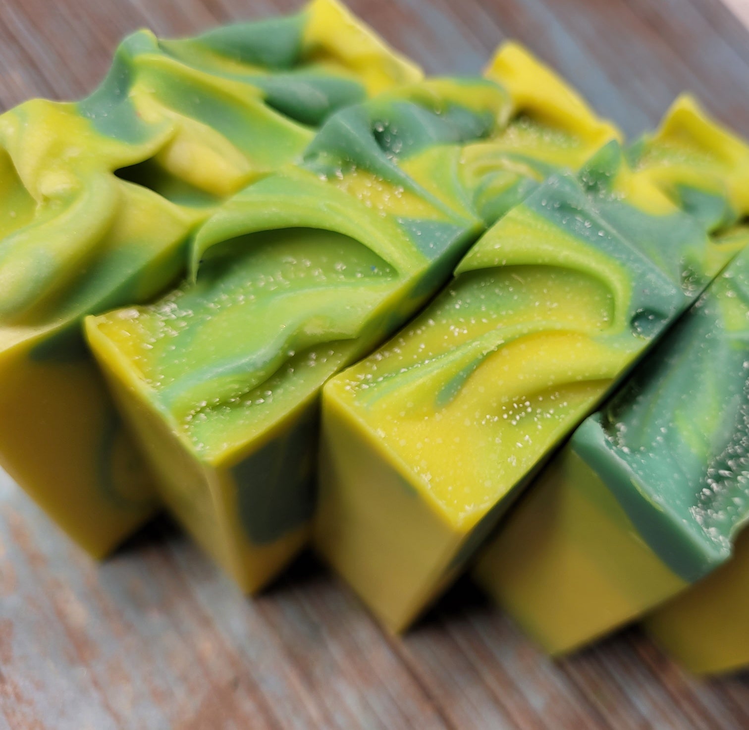 Handmade Lemon Eucalyptus Soap bar with natural ingredients, showcasing its unique design and texture.