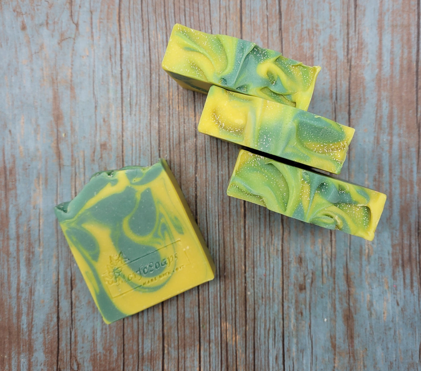 Handmade Lemon Eucalyptus Soap bar with natural ingredients, showcasing its unique design and texture.