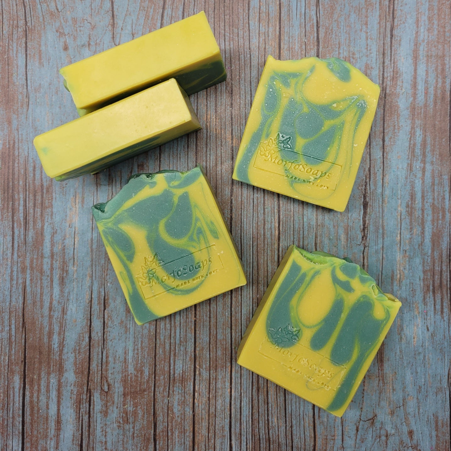 Handmade Lemon Eucalyptus Soap bar with natural ingredients, showcasing its unique design and texture.