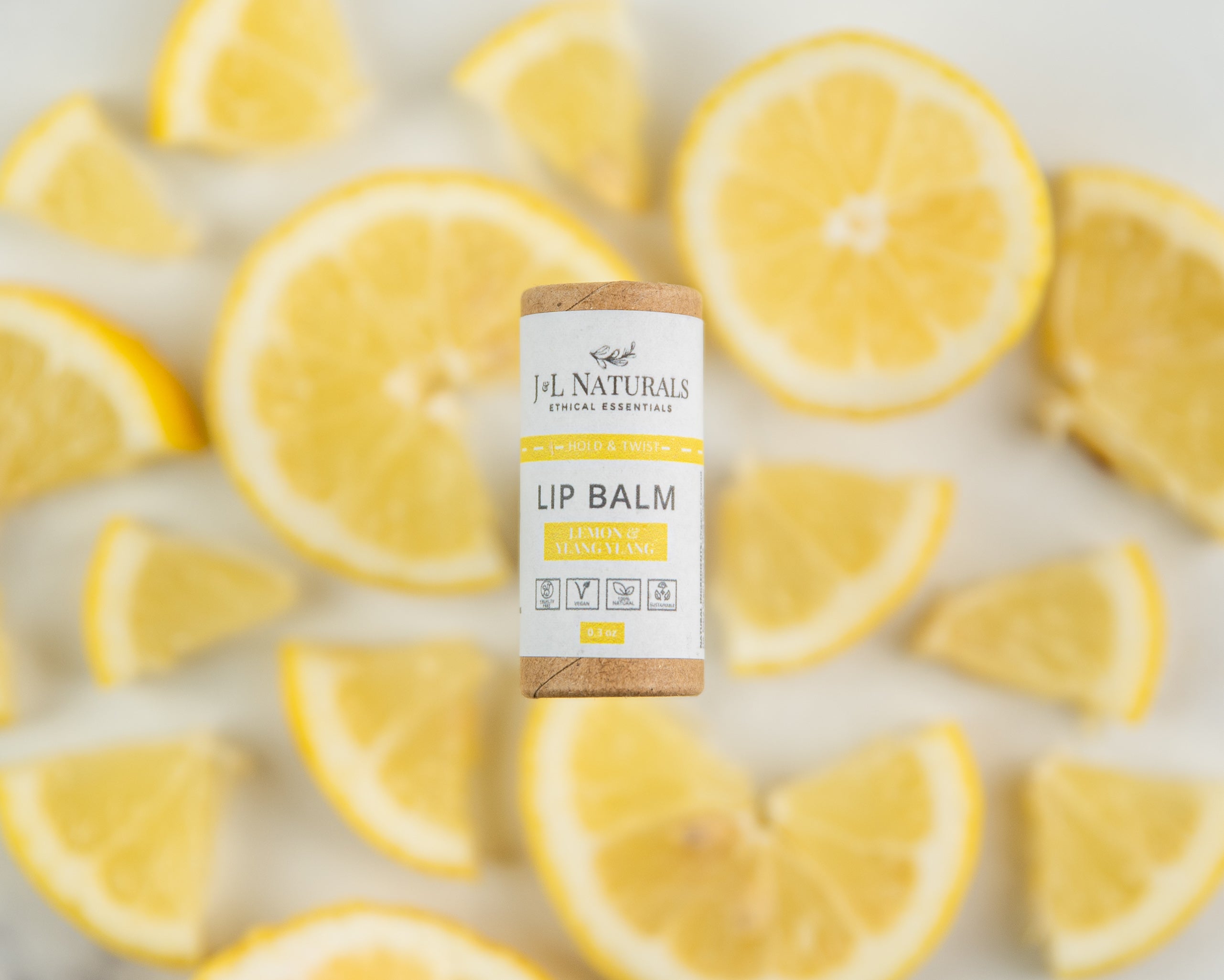 A collection of five lip balms in various flavors, showcasing their vibrant packaging and natural ingredients.