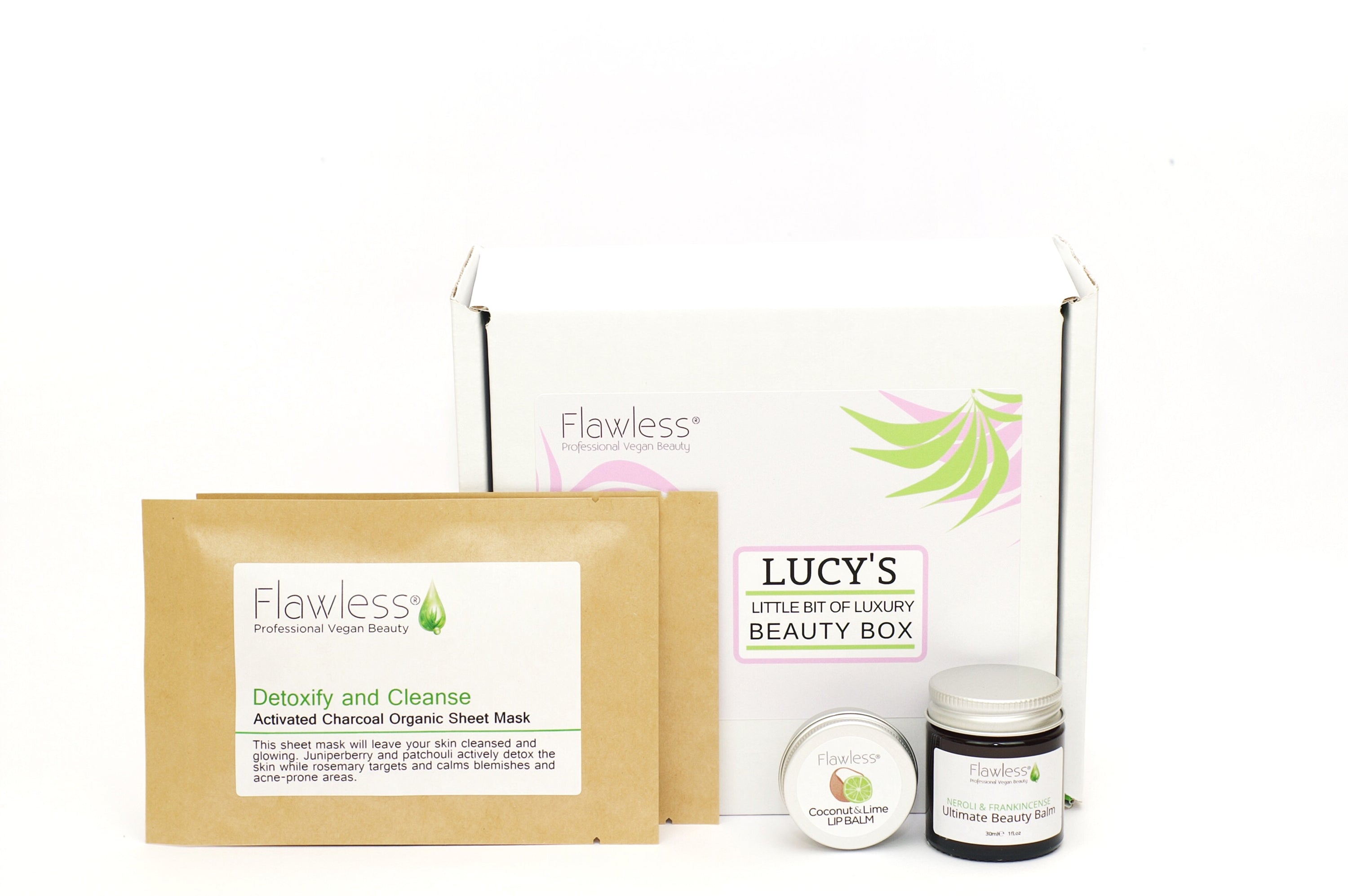 Little Bit of Luxury Gift Box featuring vegan beauty products including sheet masks, beauty balm, and lip balm in eco-friendly packaging.