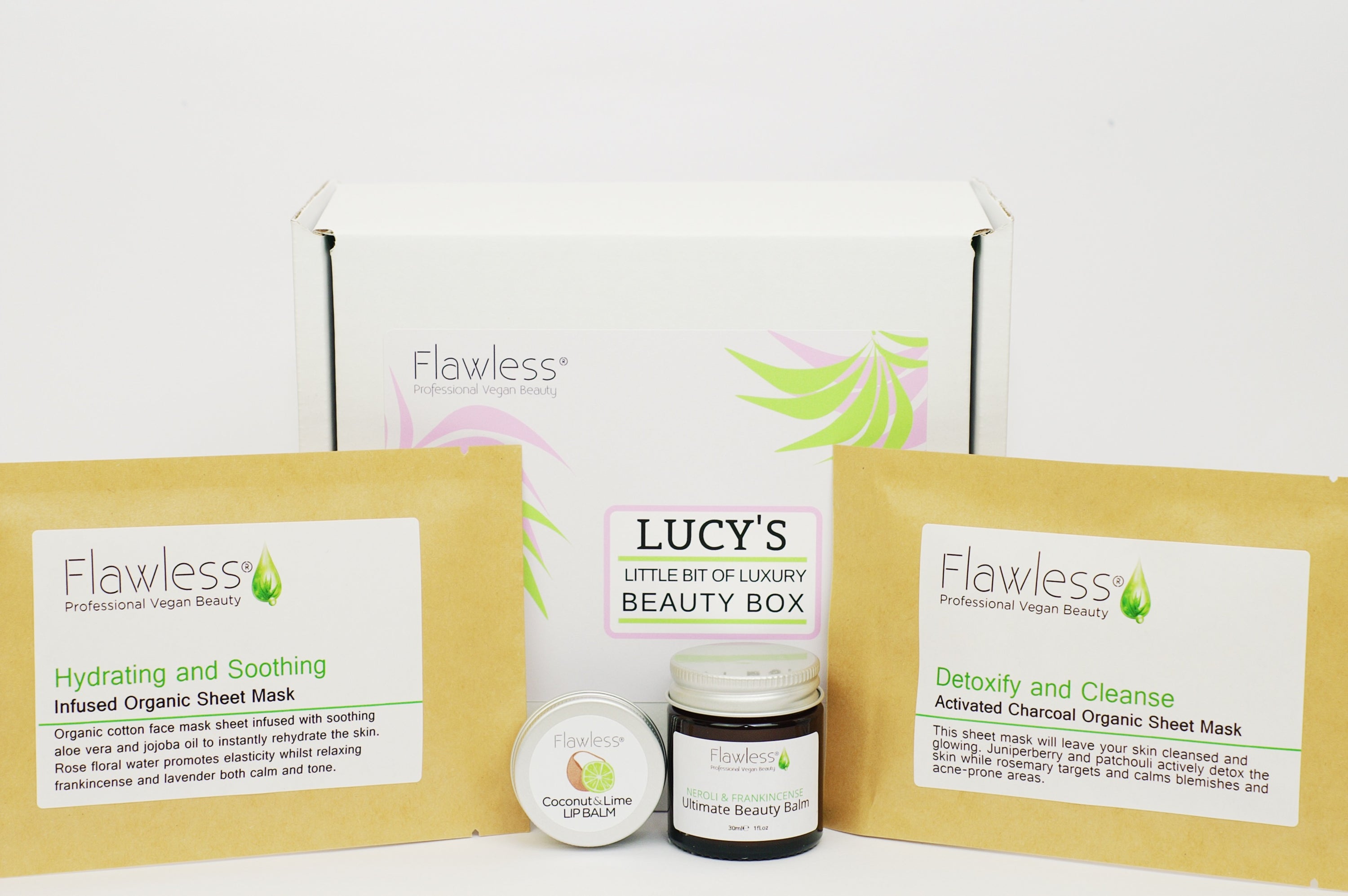 Little Bit of Luxury Gift Box featuring vegan beauty products including sheet masks, beauty balm, and lip balm in eco-friendly packaging.