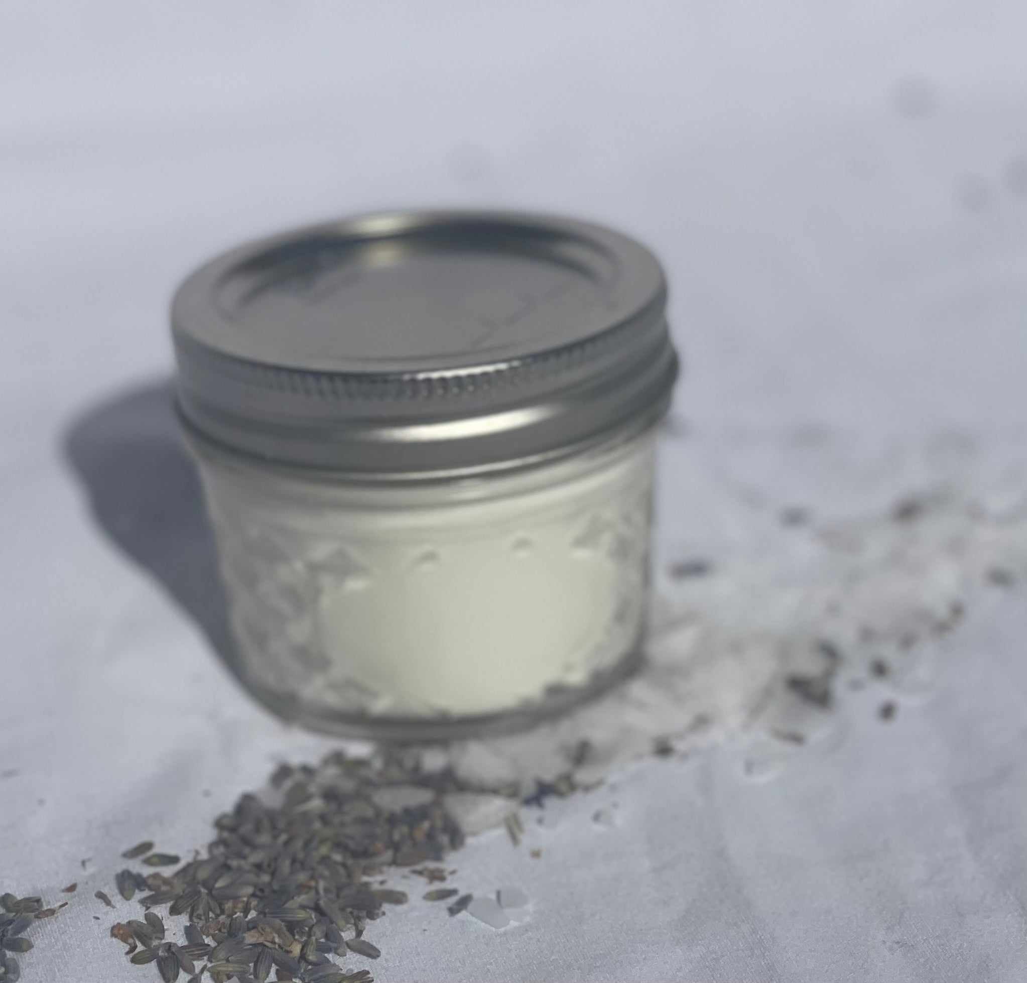 MAG+IC Lotion in a refillable mason jar, showcasing its natural ingredients and soothing properties.