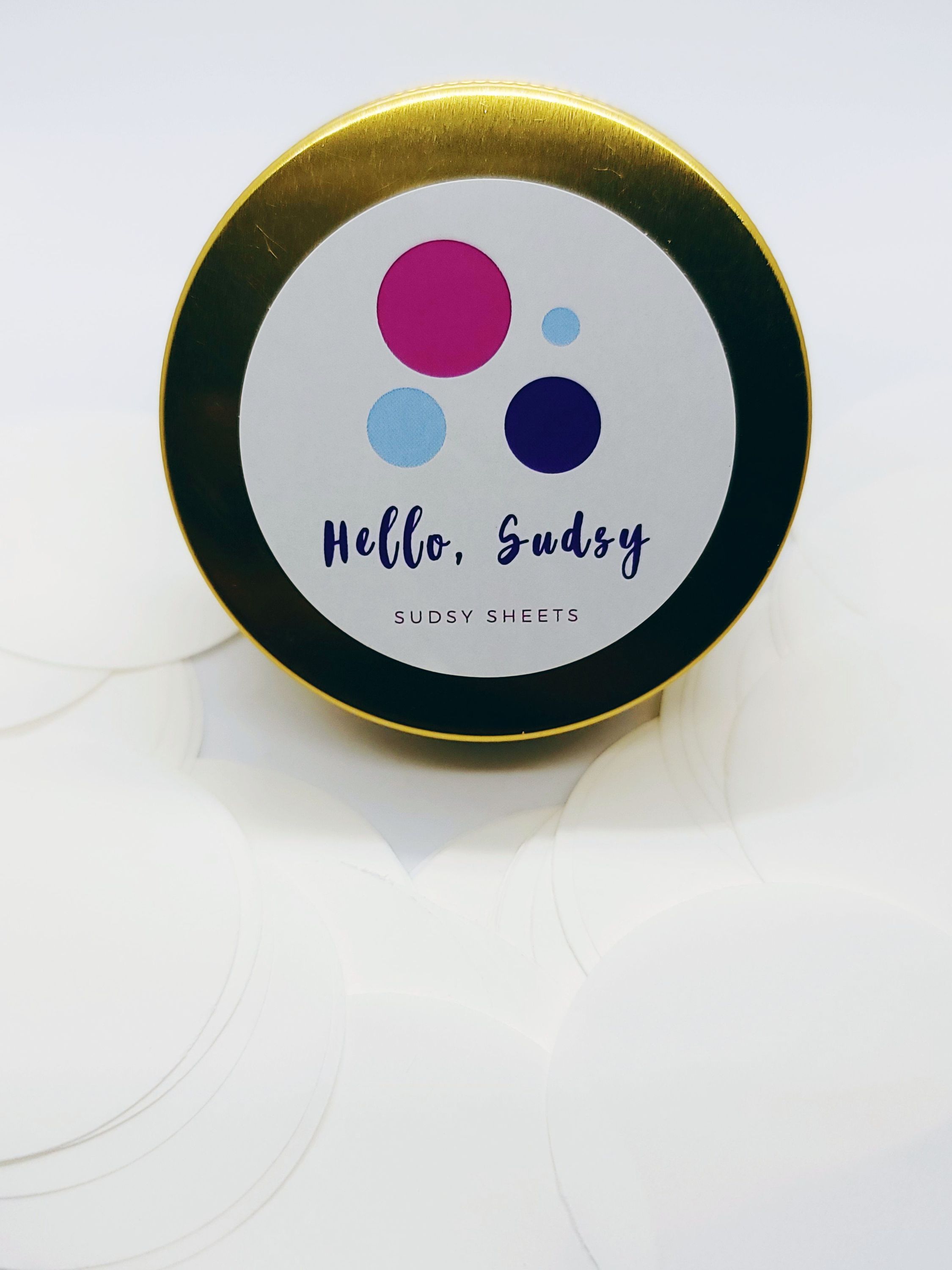 Mango Butter Sudsy Sheets in a reusable container, showcasing eco-friendly soap sheets for hand washing.