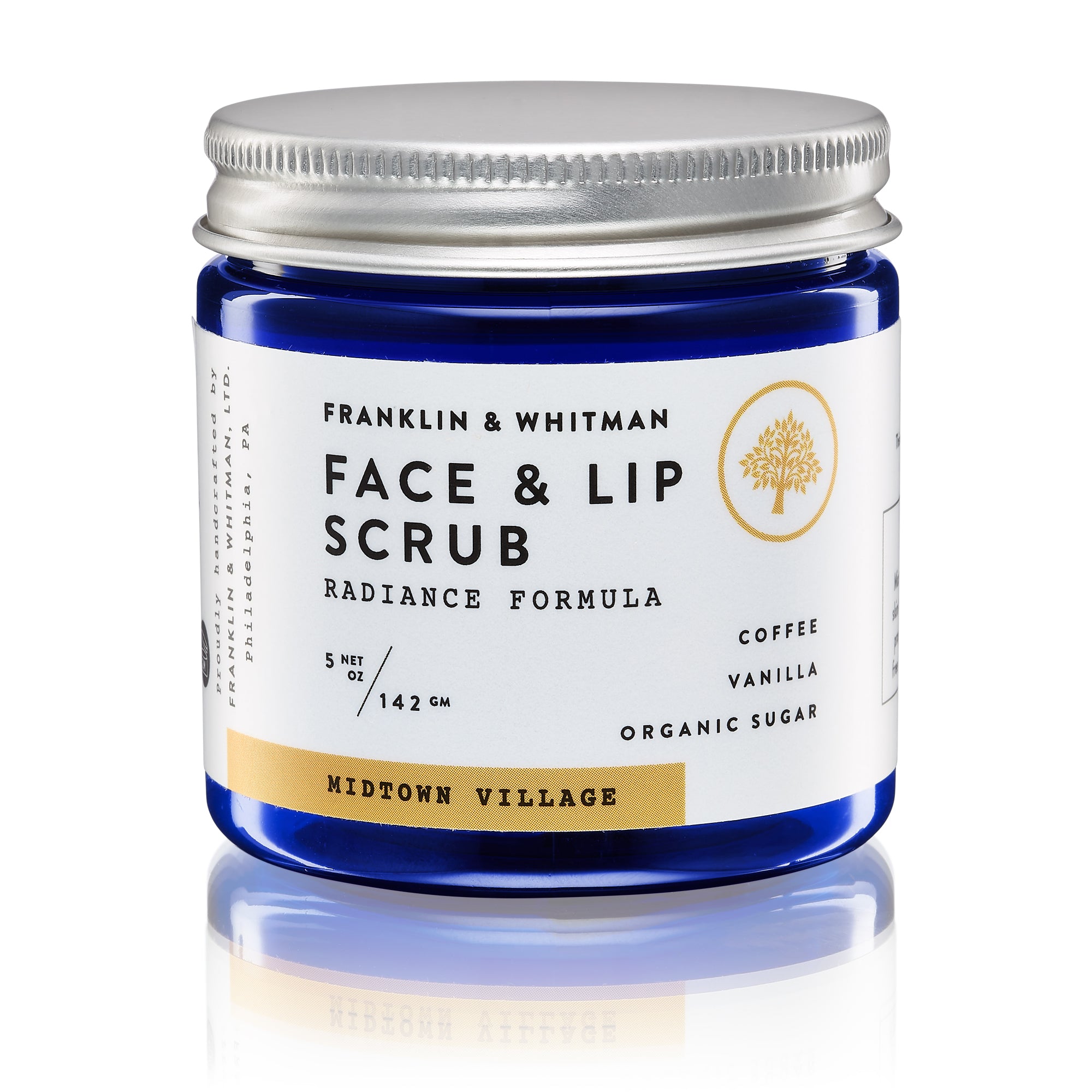 Midtown Village Lip & Face Scrub in a 4oz BPA-free jar, showcasing its natural ingredients and creamy texture.