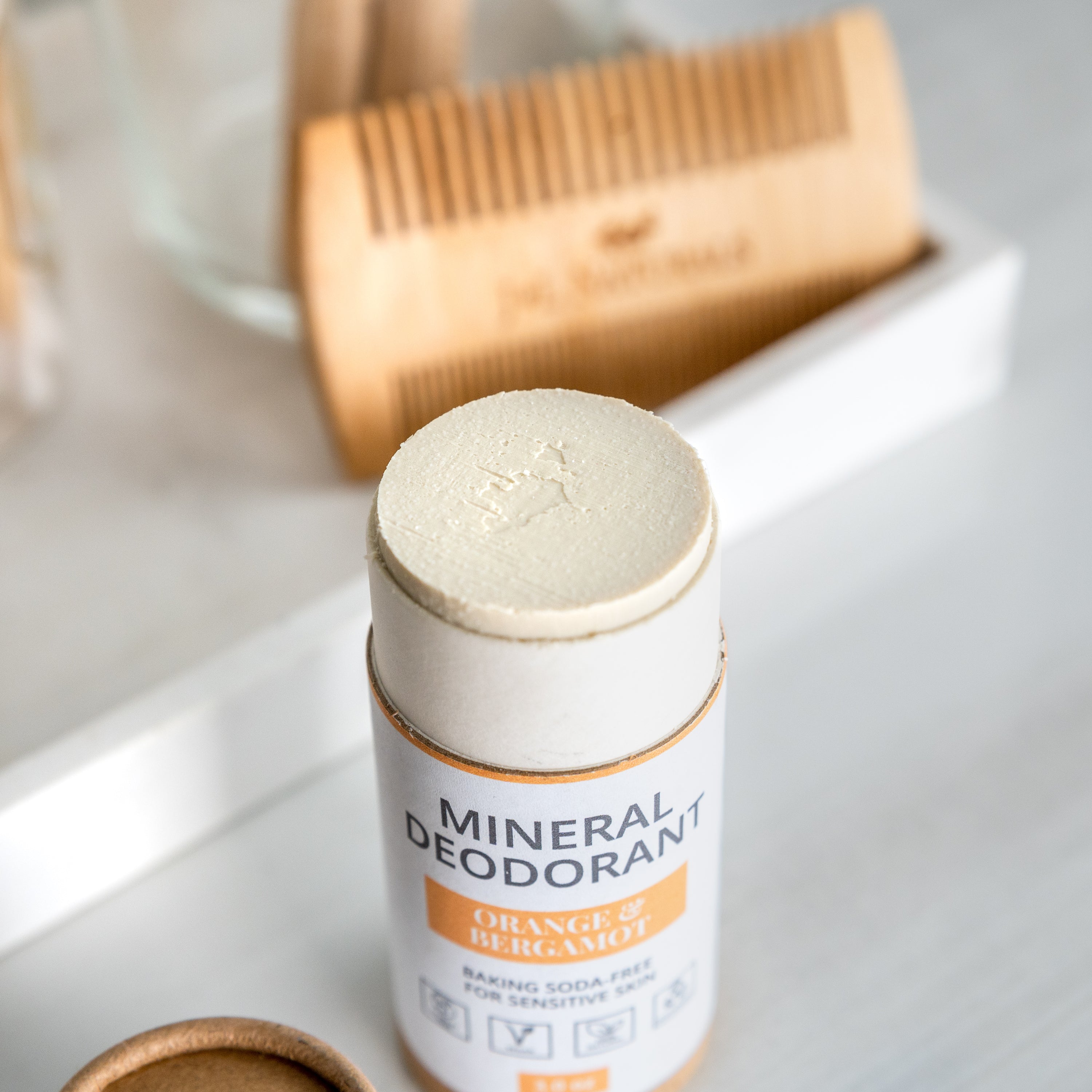 A 4-pack of Mineral Deodorant sticks, featuring a smooth glide-on formula, suitable for sensitive skin and baking soda-free.